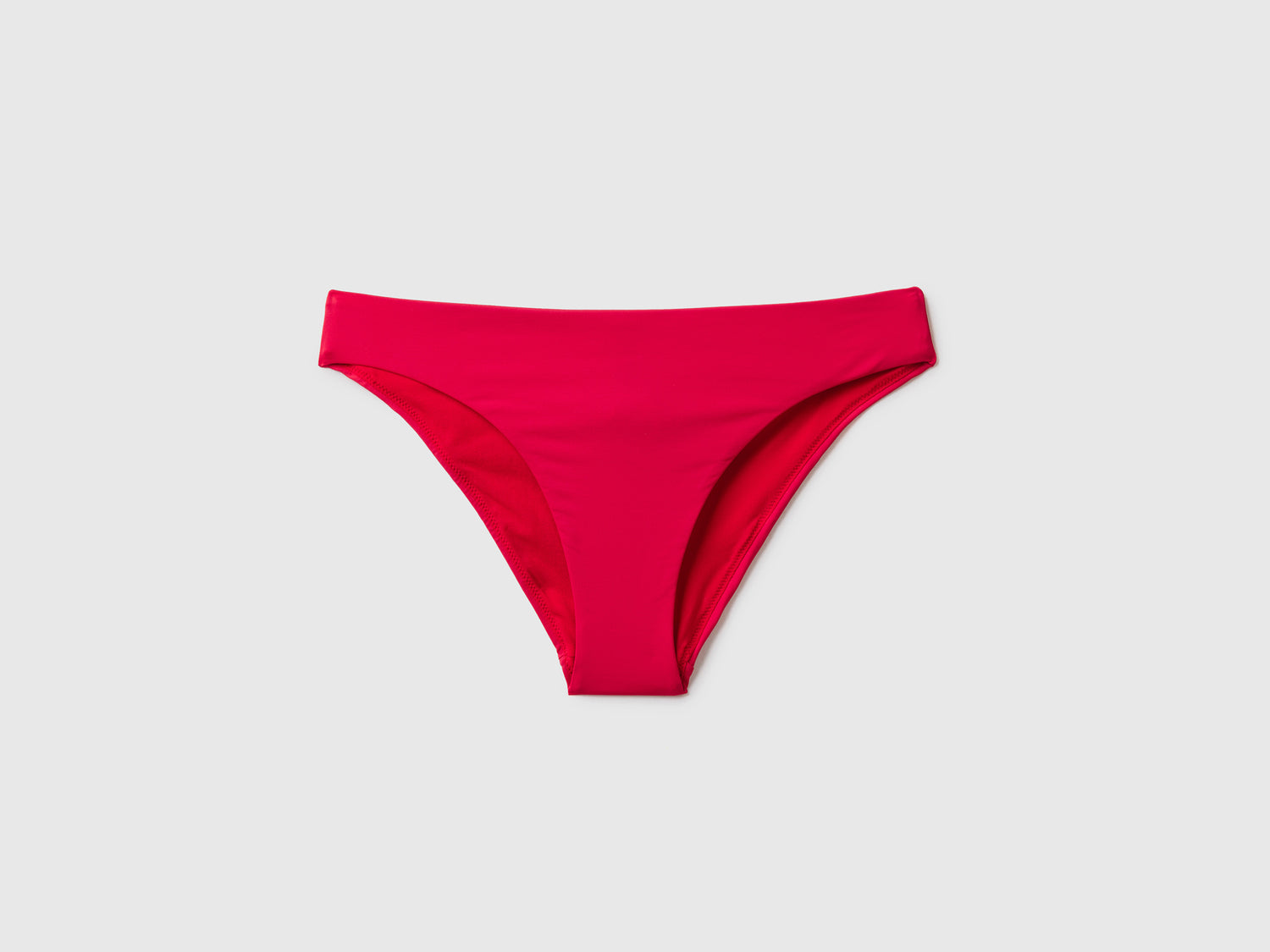 Slip costume basico in ECONYL® da donna fragola | Benetton Outlet