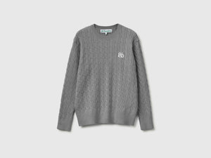 Maglione con trecce