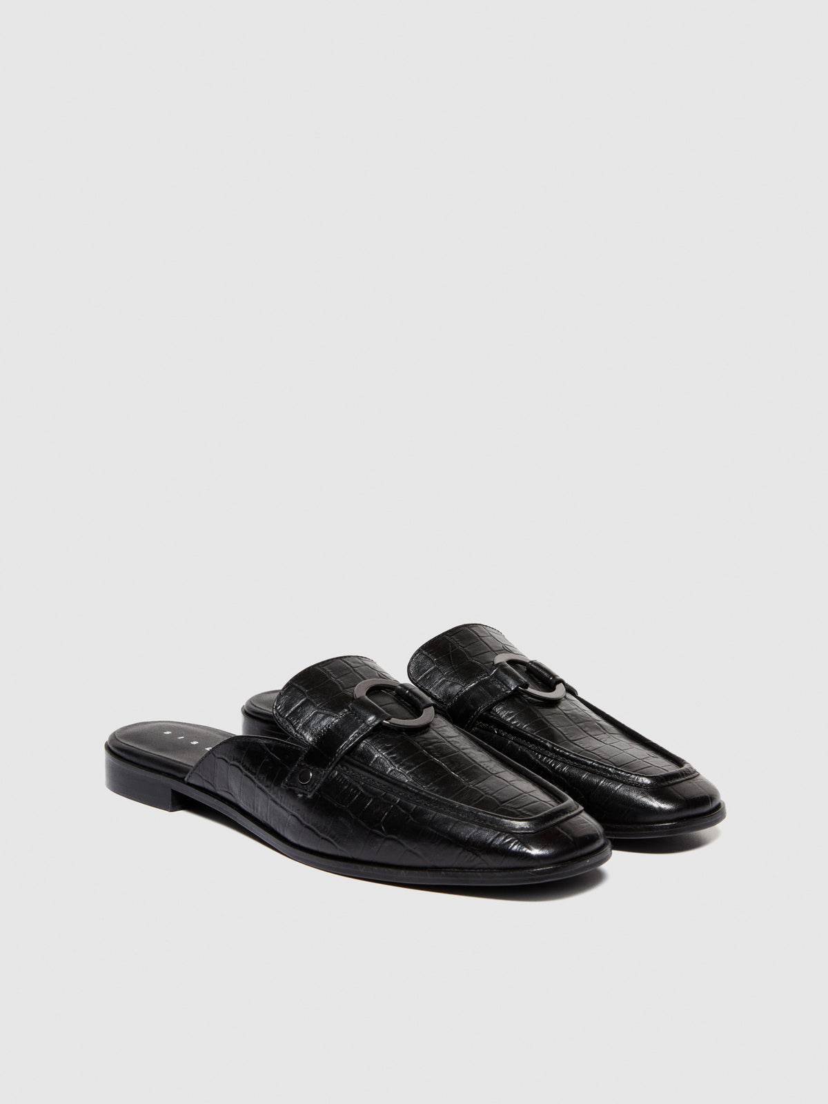 Mules in pelle