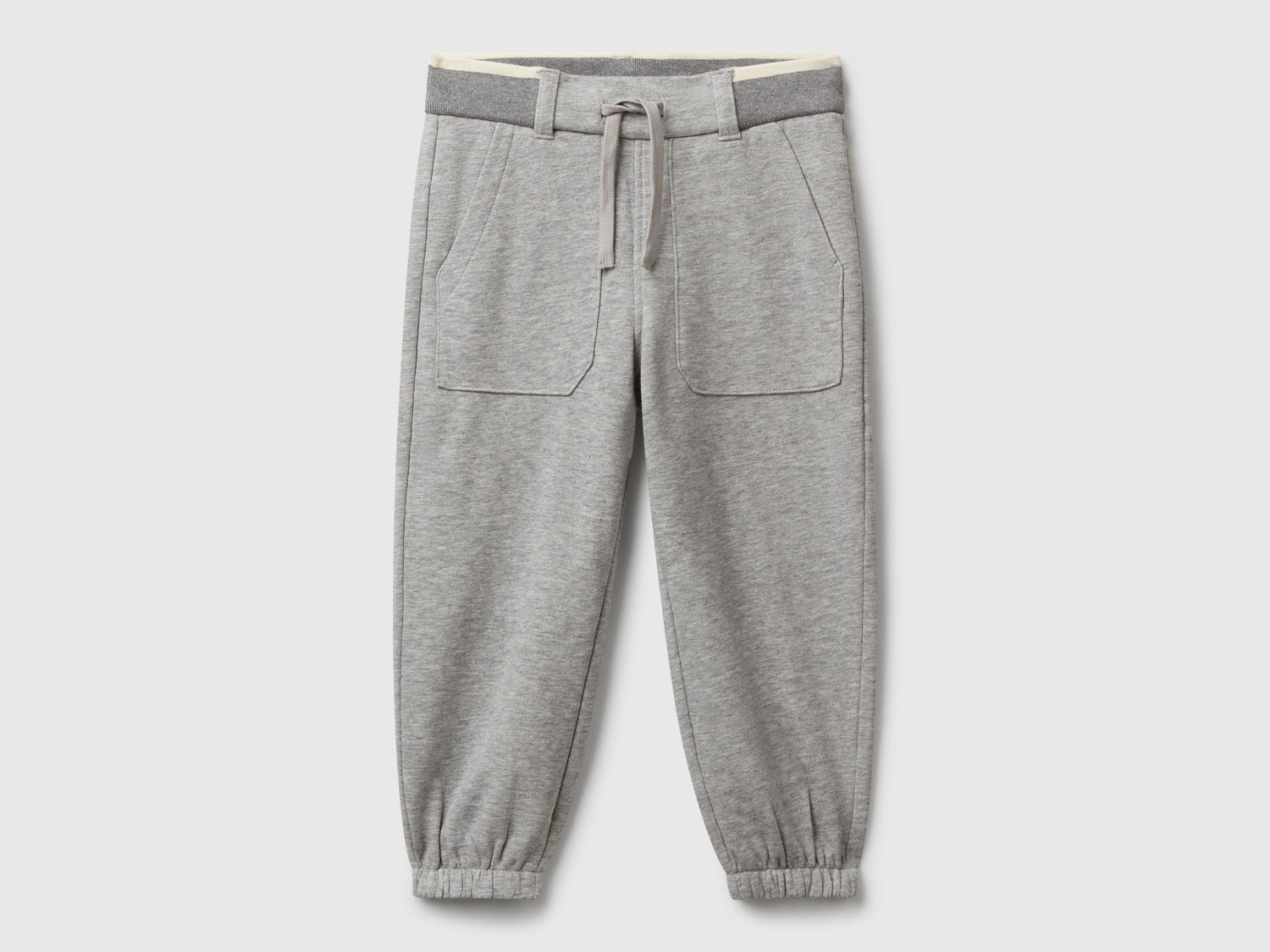 Pantaloni in felpa con coulisse da bimbo grigio chiaro | Benetton Outlet