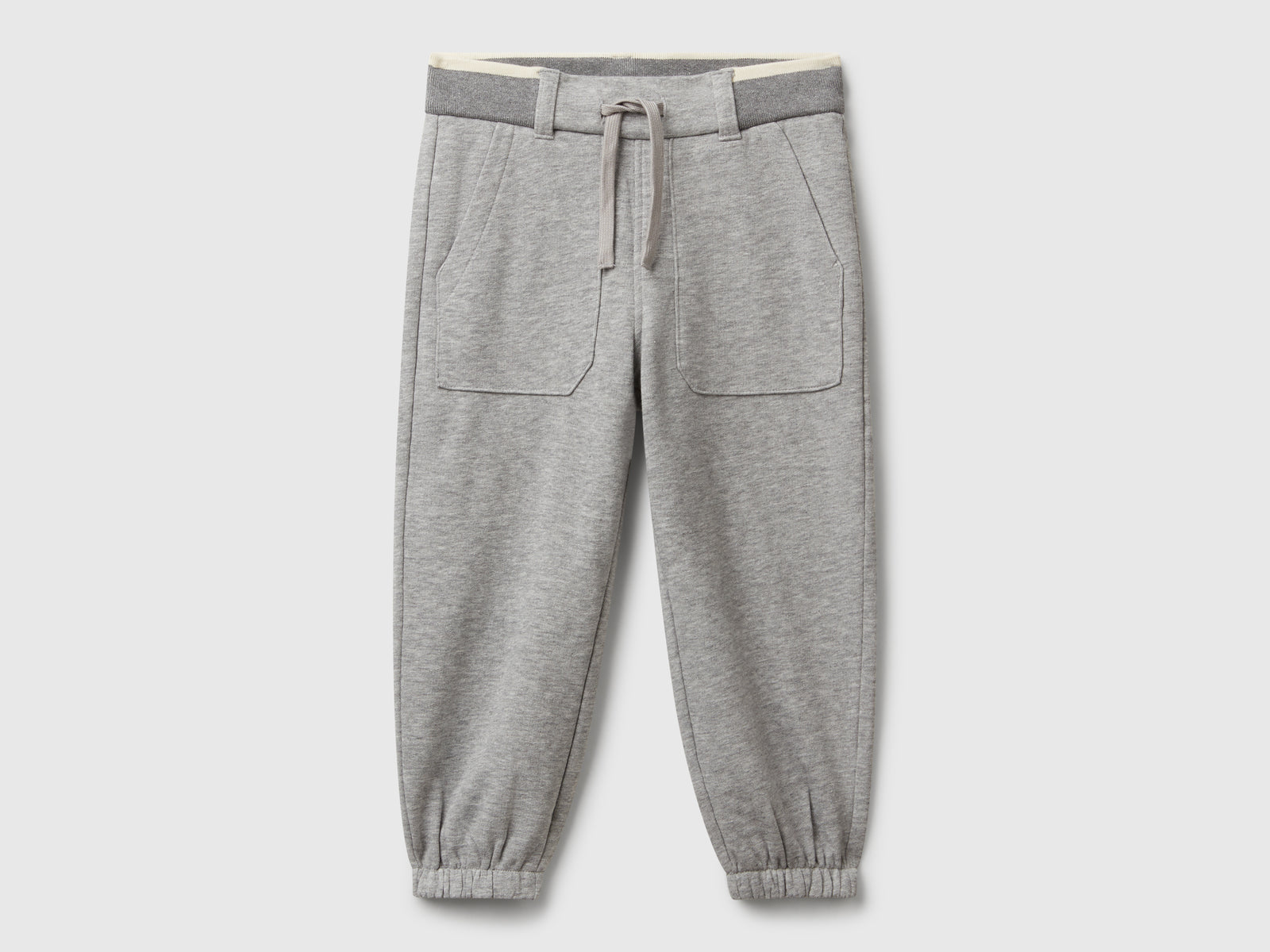 Pantaloni in felpa con coulisse da bimbo grigio chiaro | Benetton Outlet