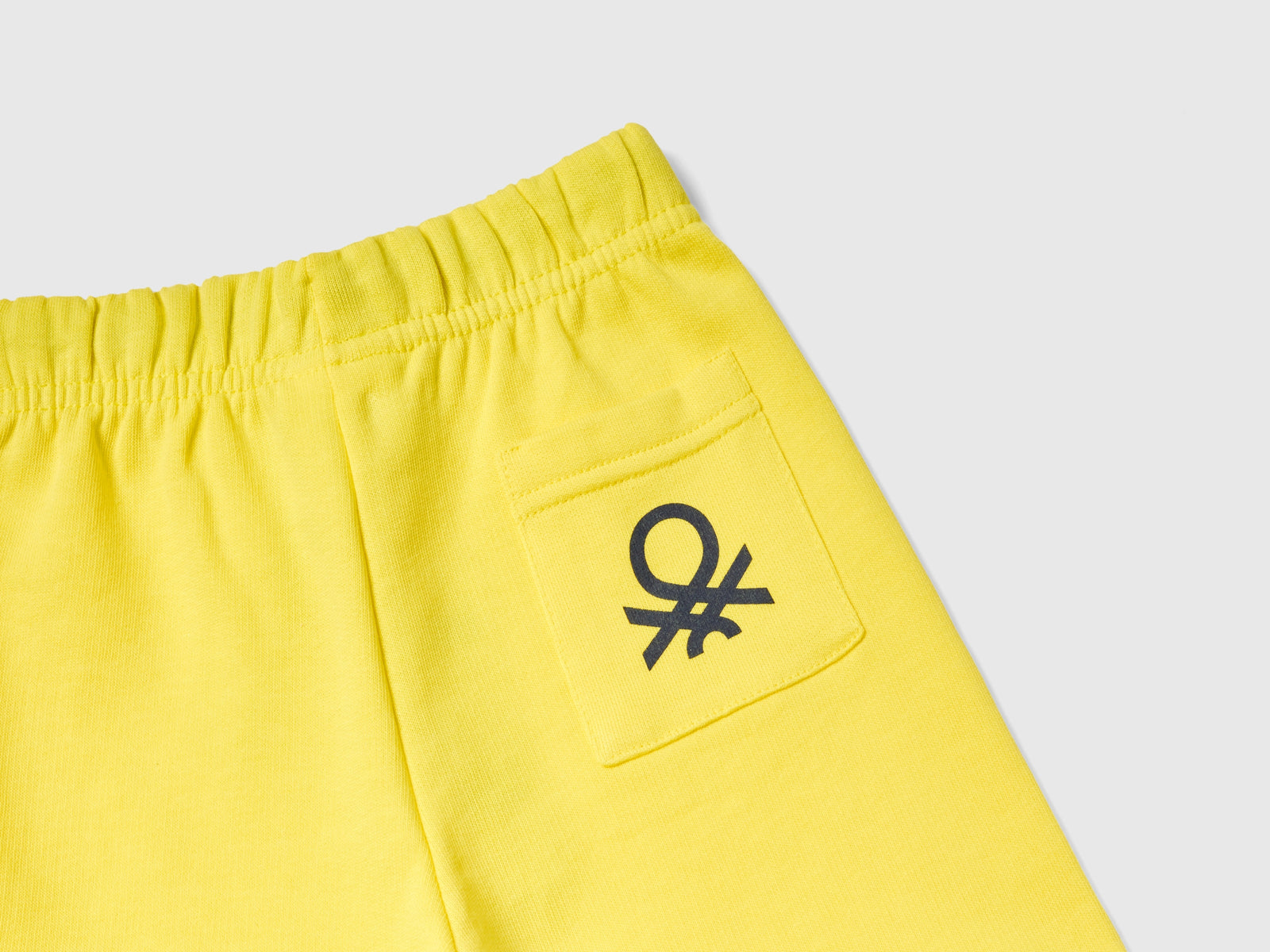 Bermuda in felpa 100% cotone bio da bimbo giallo 2 | Benetton Outlet
