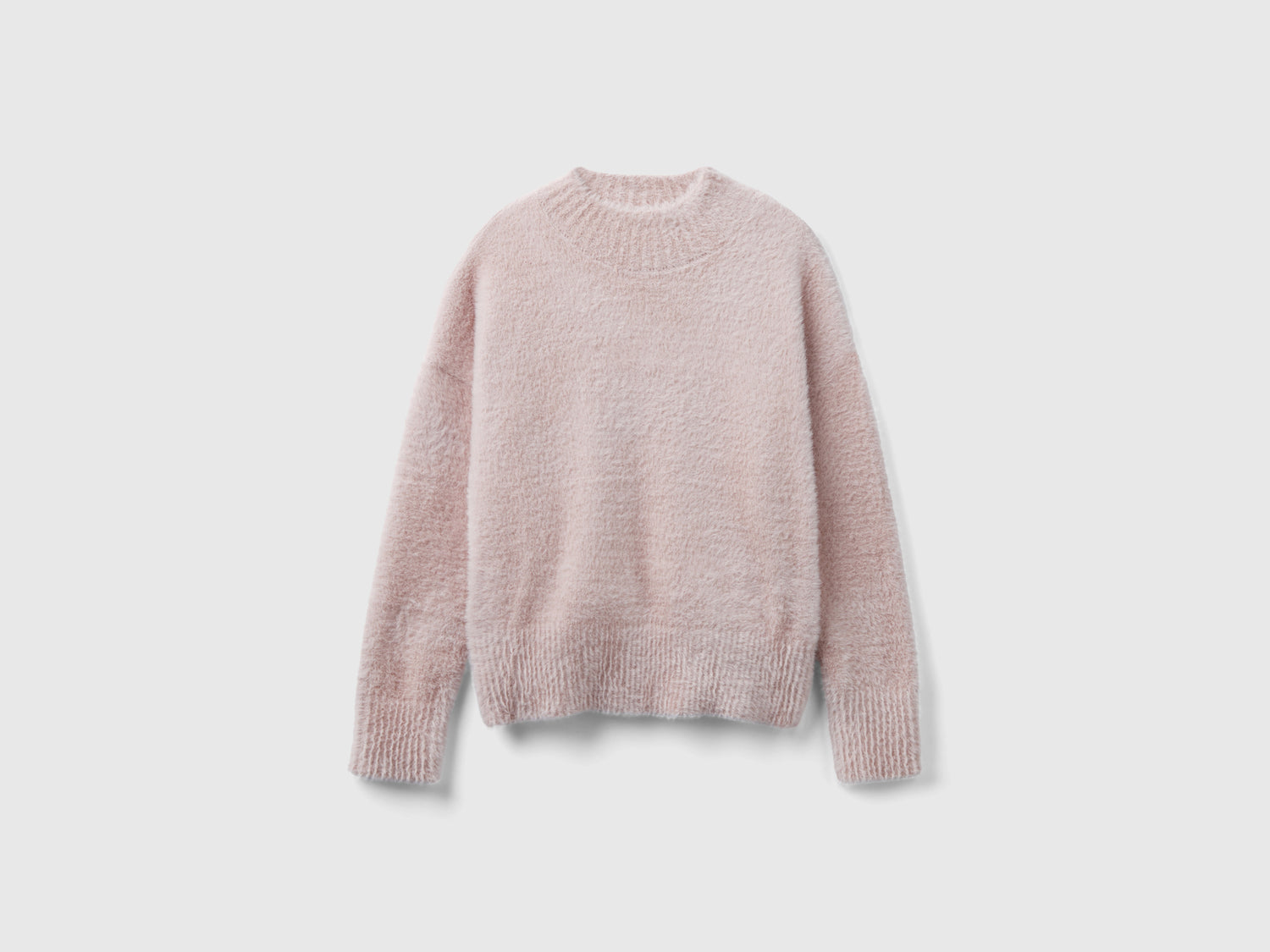 Maglia lupetto in filato peloso da bambina rosa | Benetton Outlet