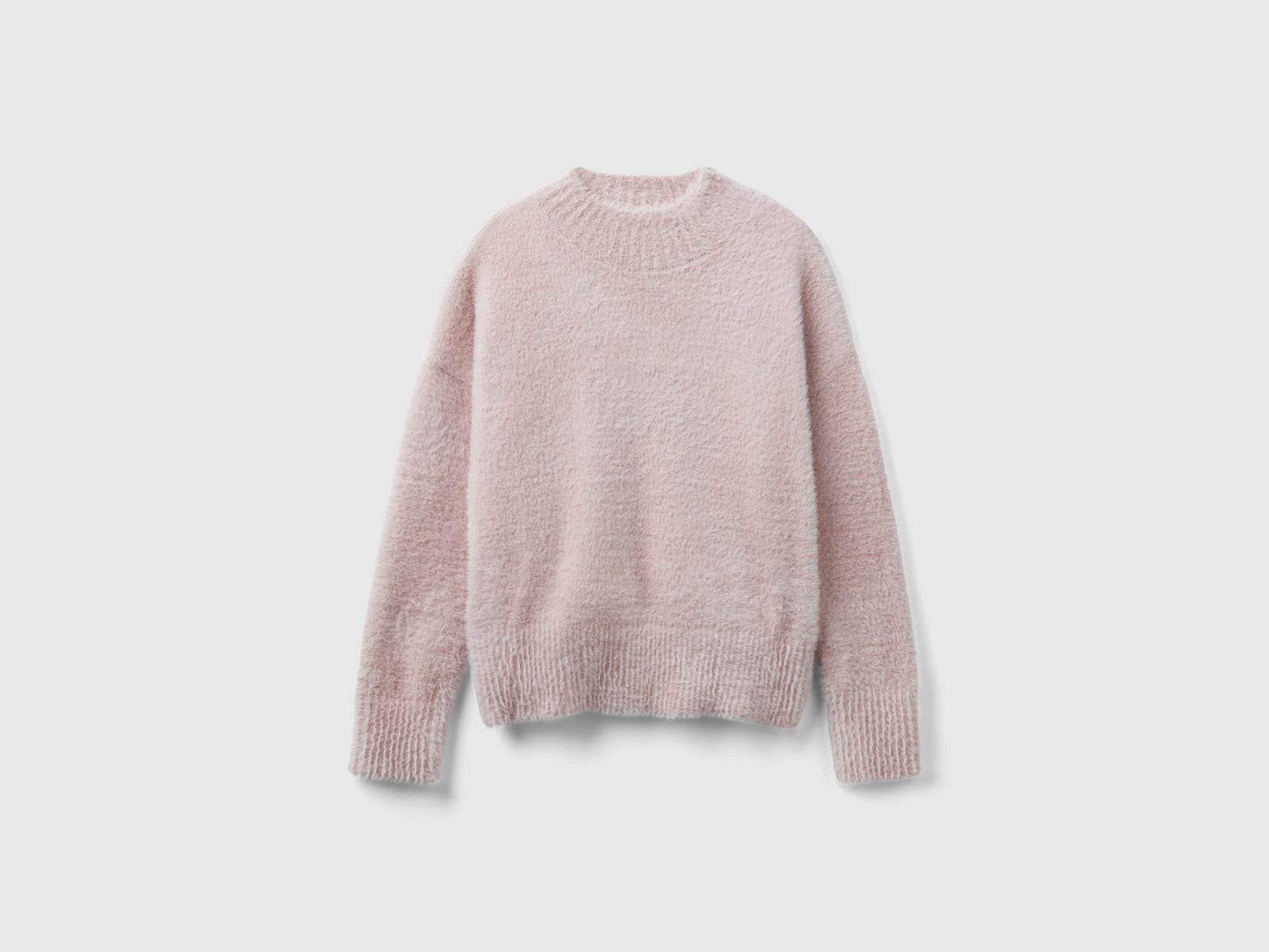 Maglia lupetto in filato peloso da bambina rosa | Benetton Outlet