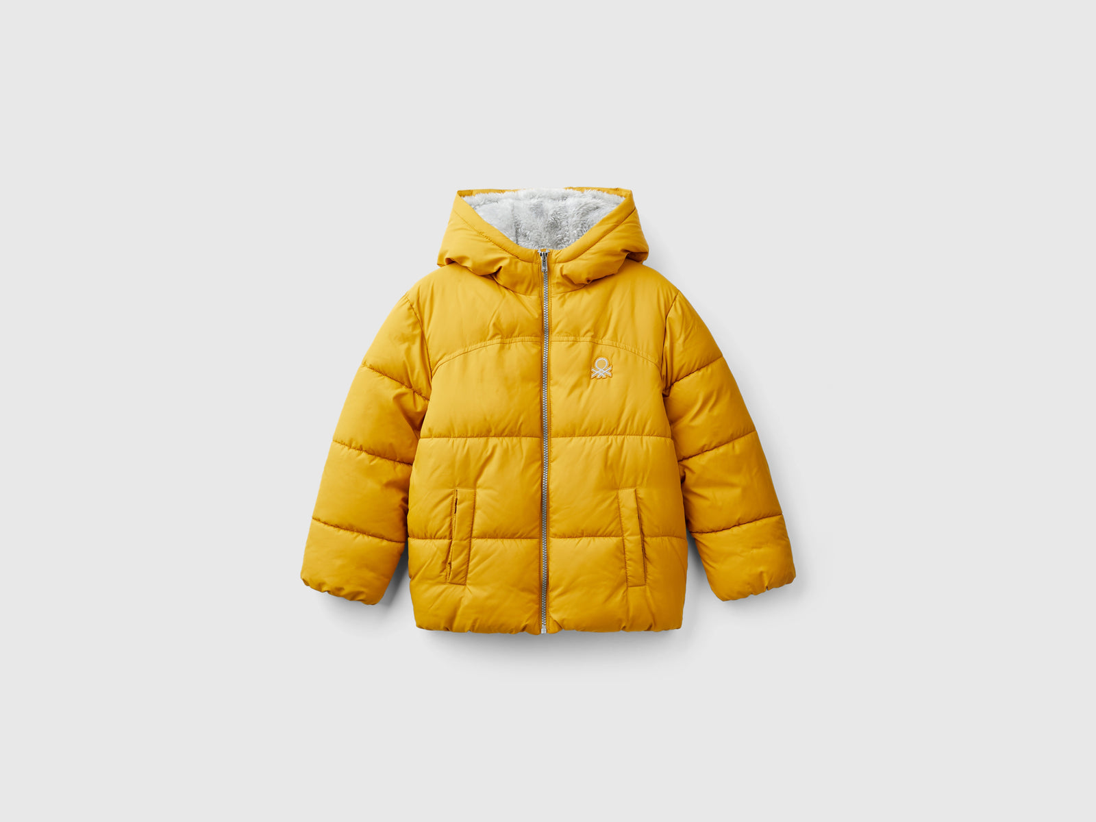 Giubbotto imbottito con interno orsetto da bambino senape | Benetton Outlet
