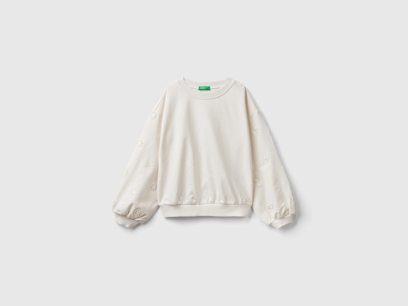 Felpa con fiori ricamati da bambina bianco panna | Benetton Outlet