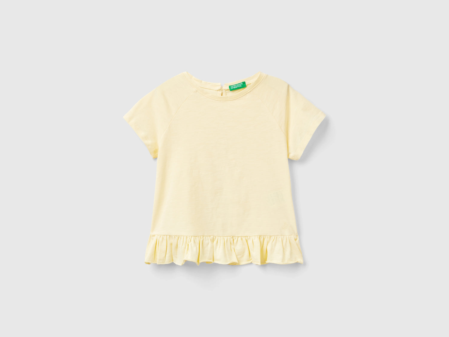 T-shirt con volant da bambina bianco panna | Benetton Outlet