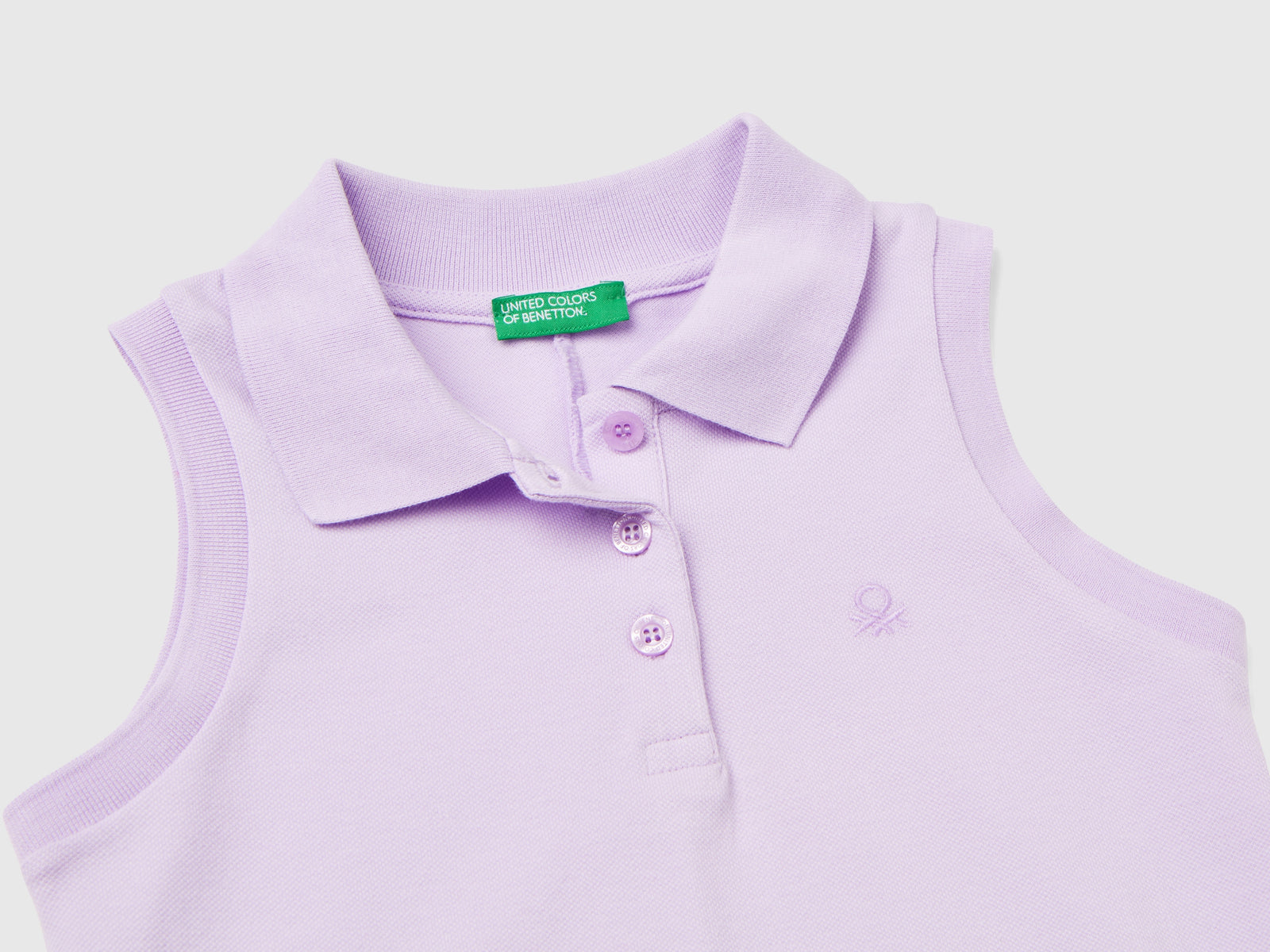Vestito smanicato stile polo da bambina lilla 2 | Benetton Outlet