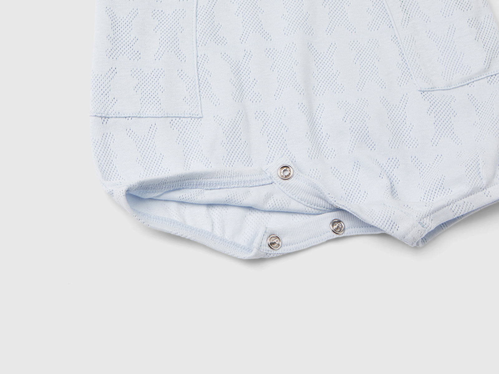 Tuta smanicata con taschini da neonato azzurro 2 | Benetton Outlet