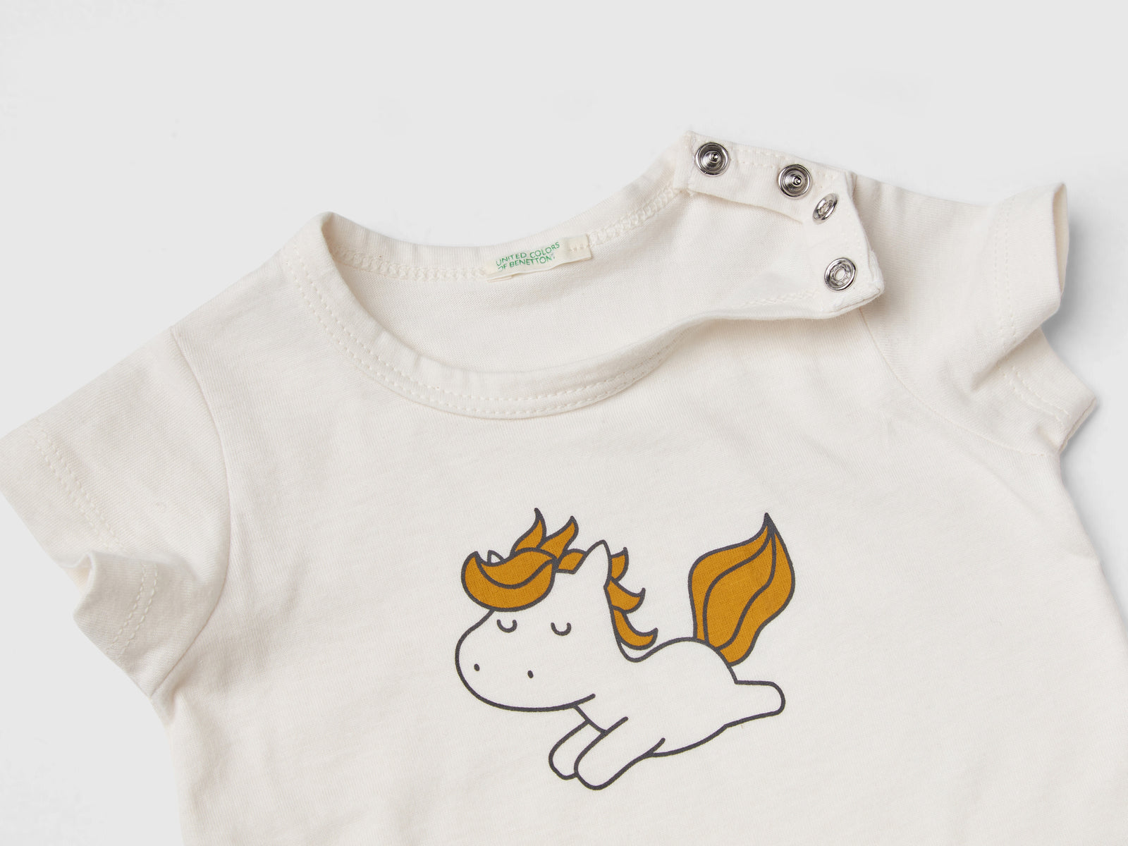 T-shirt manica corta in cotone bio da neonato bianco panna 2 | Benetton Outlet