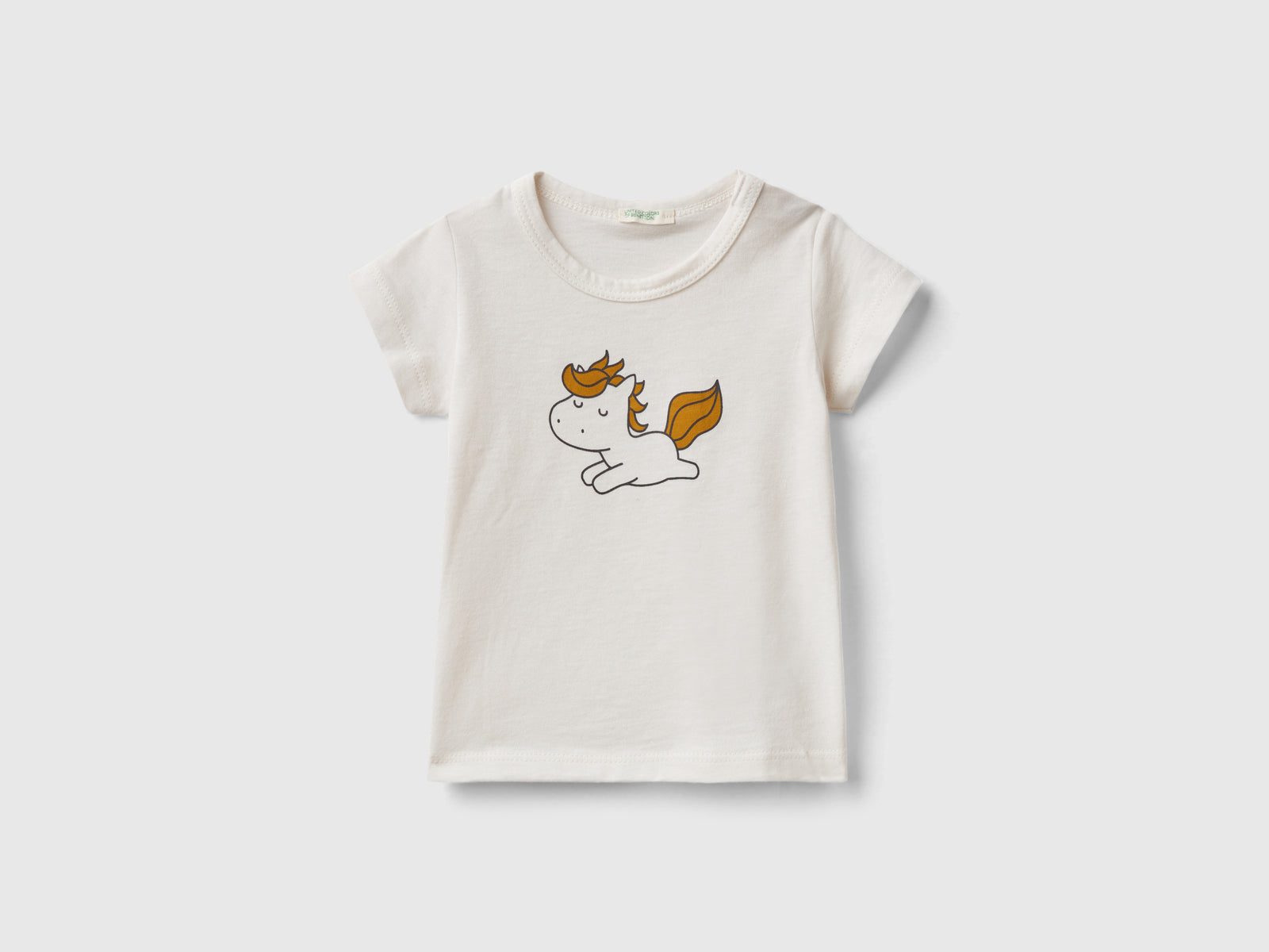 T-shirt manica corta in cotone bio da neonato bianco panna | Benetton Outlet