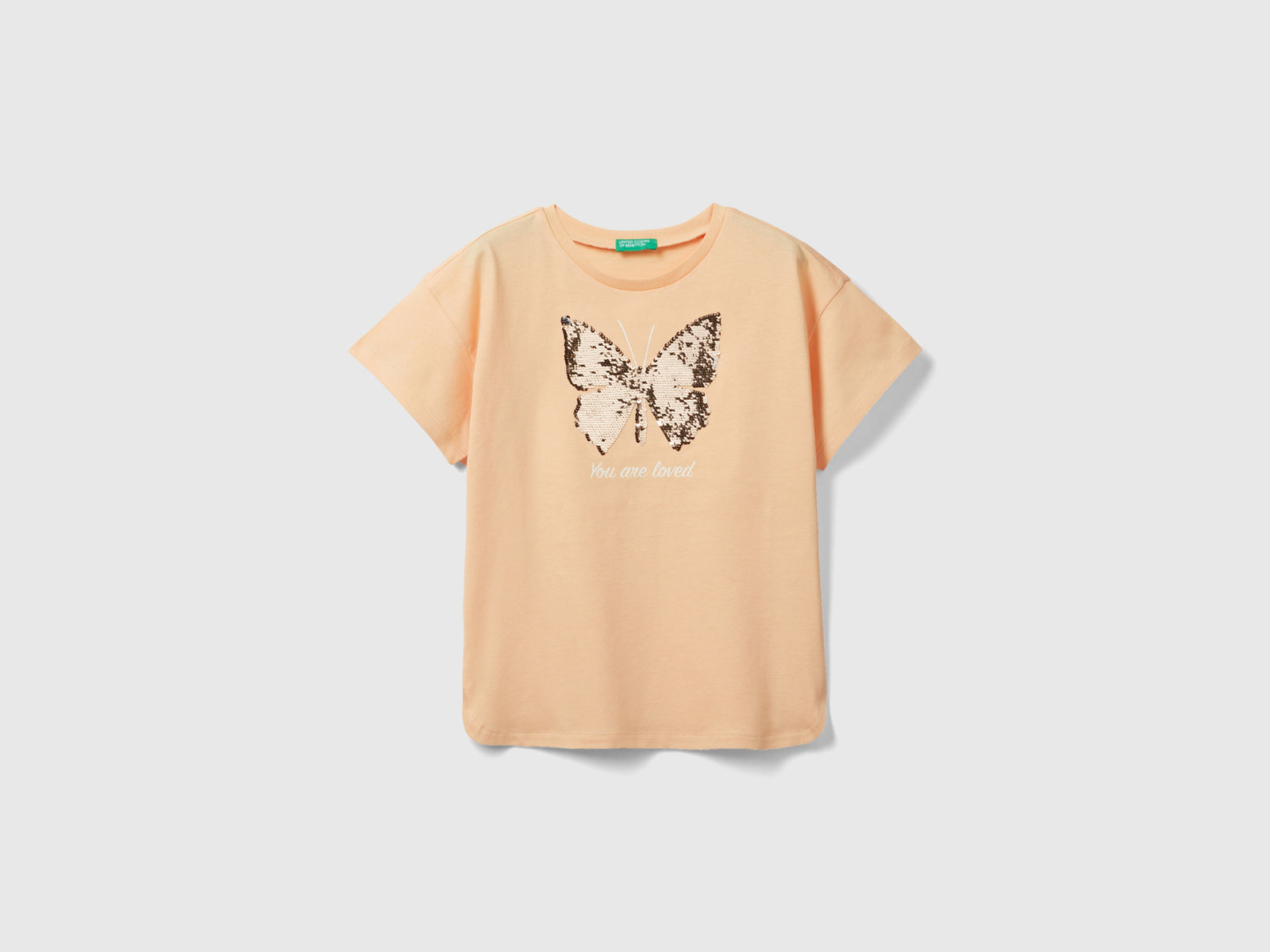 Maglietta con paillettes reversibili da bambina pesca | Benetton Outlet