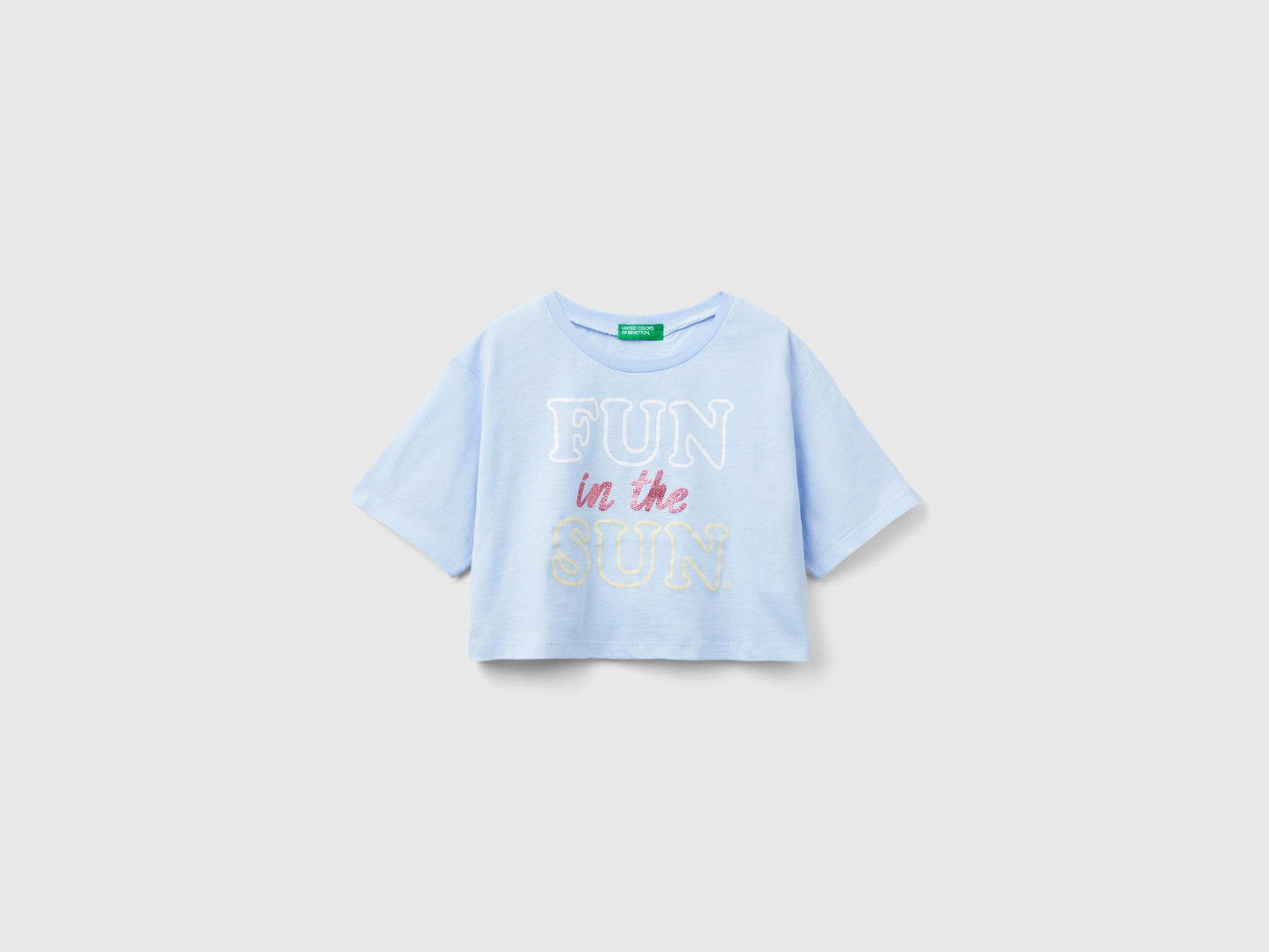 Maglietta con stampa glitter da bambina celeste | Benetton Outlet