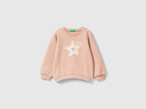 Sweatshirt with petal effect application