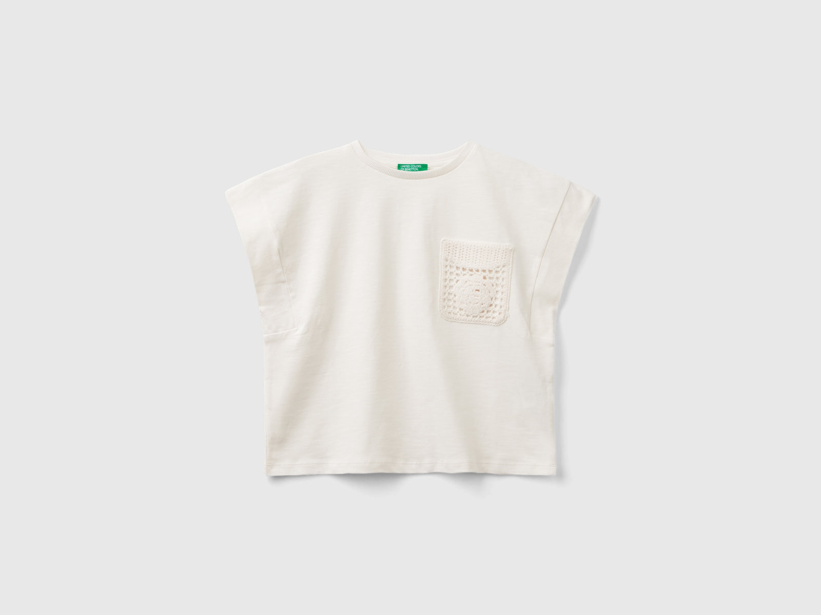 T-shirt con patch macramè da bambina bianco panna | Benetton Outlet