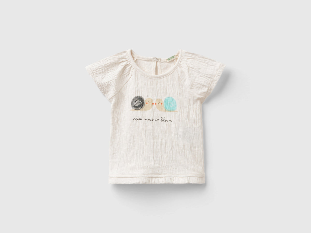 T-shirt con stampa e rouches