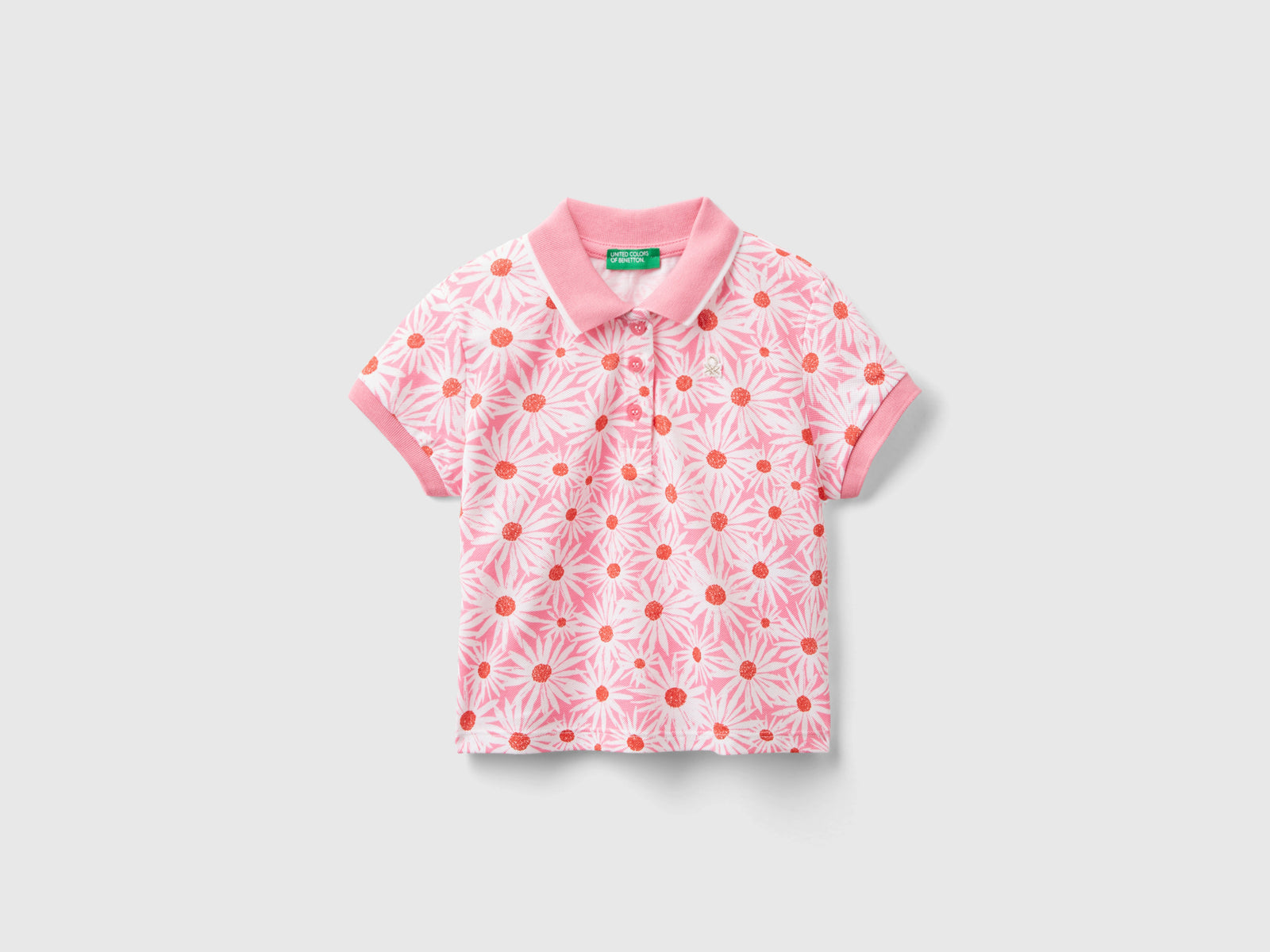 Polo con stampa fiori da bimba rosa | Benetton Outlet