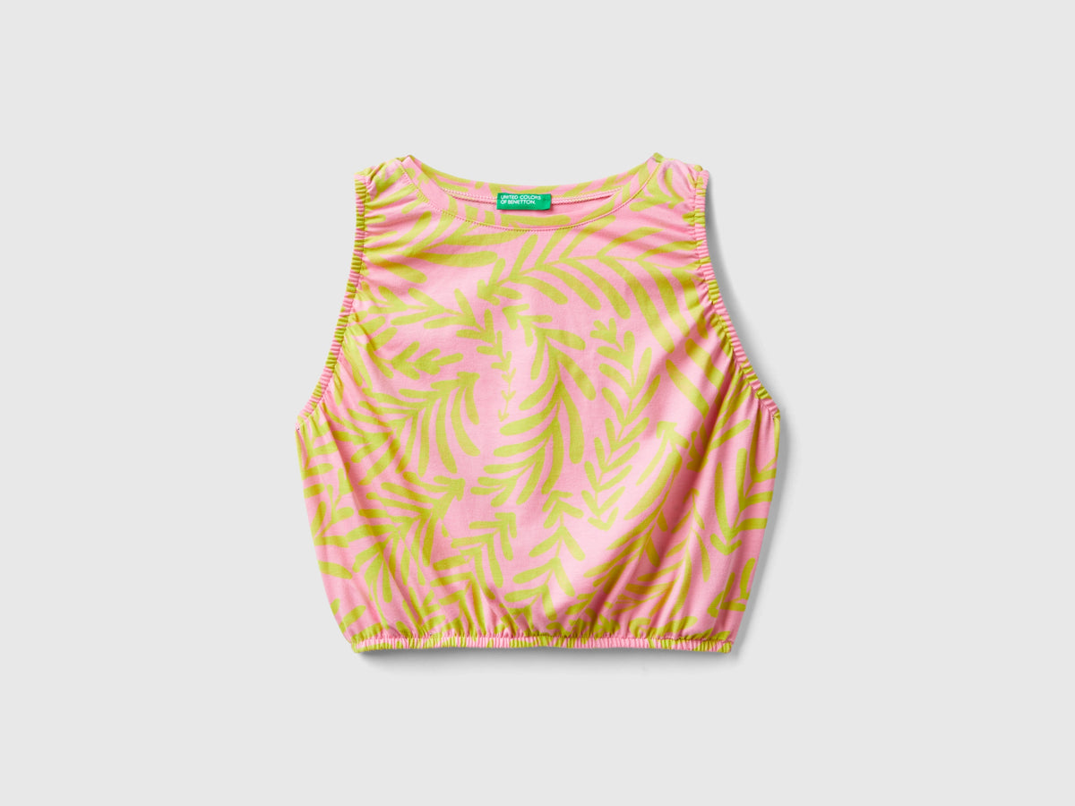 Top rosa chiaro con stampa tropicale