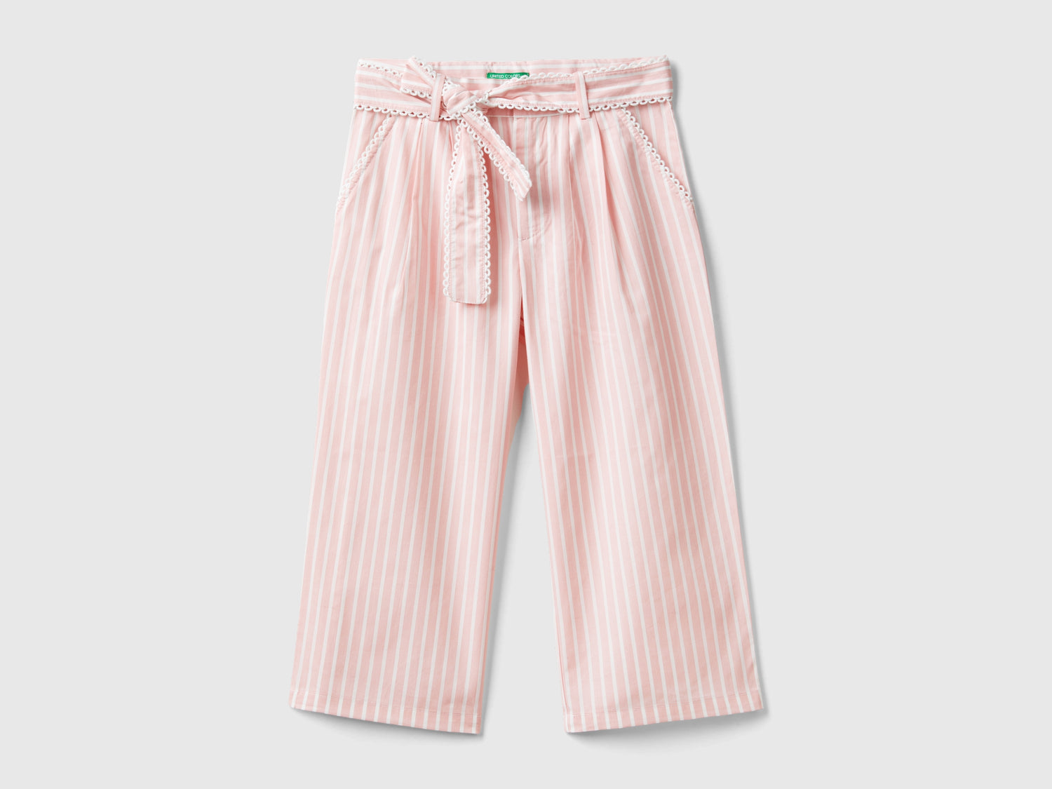 Pantaloni palazzo a righe da bimba rosa | Benetton Outlet