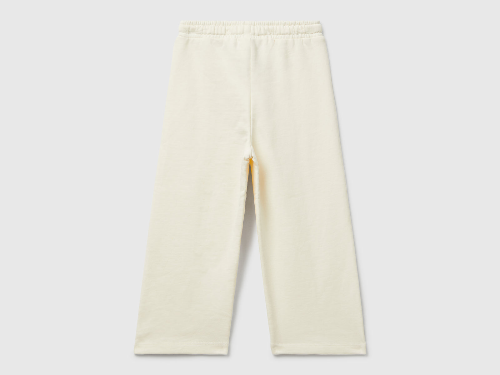 Pantaloni in felpa wide fit da bimba bianco panna 2 | Benetton Outlet