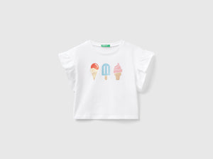 T-shirt con stampa gelati e glitter