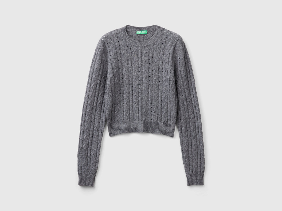 Cropped sweater with cable knit and openwork details