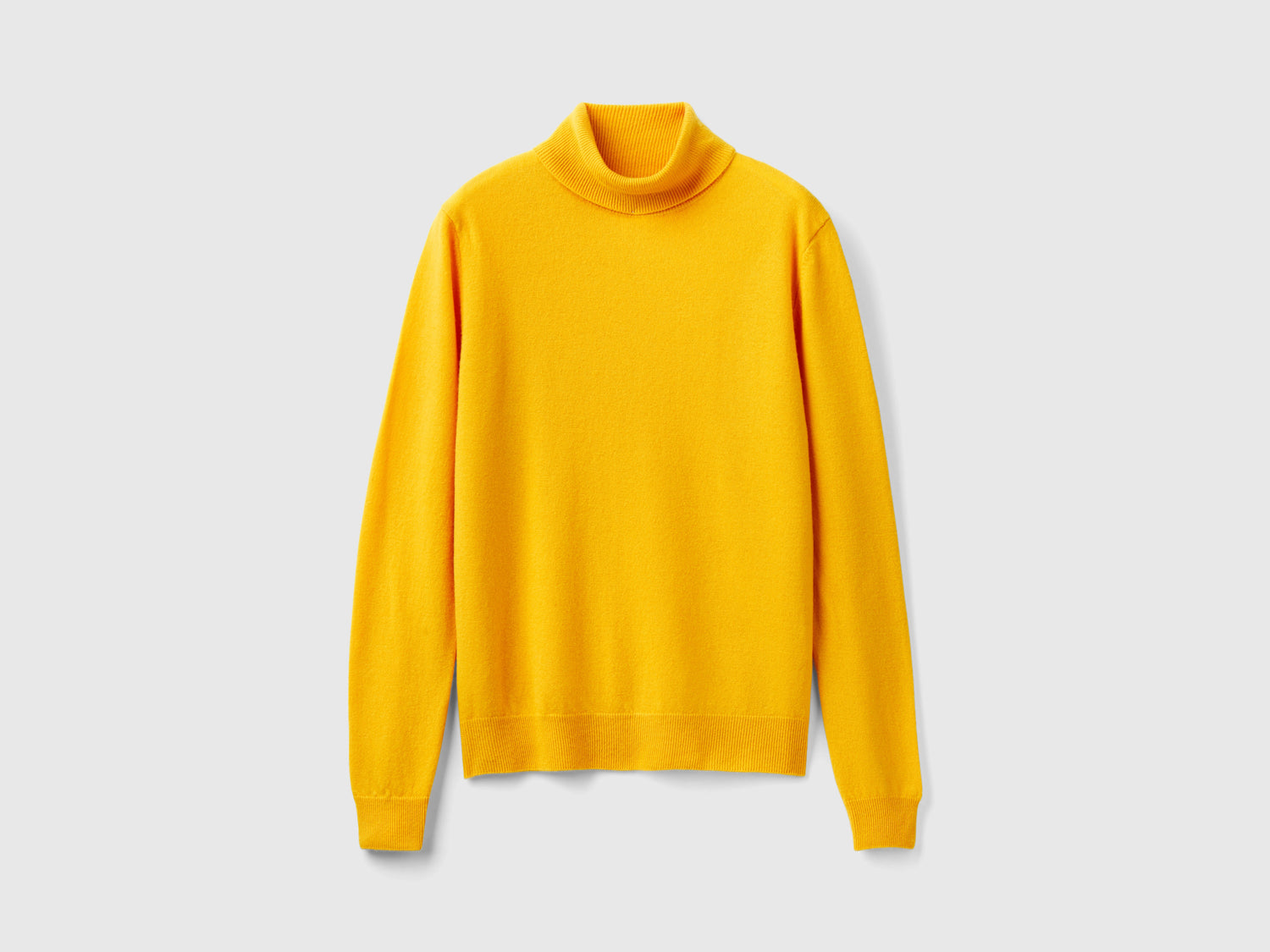 Maglione dolcevita giallo ocra in pura lana Merino da donna senape | Benetton Outlet
