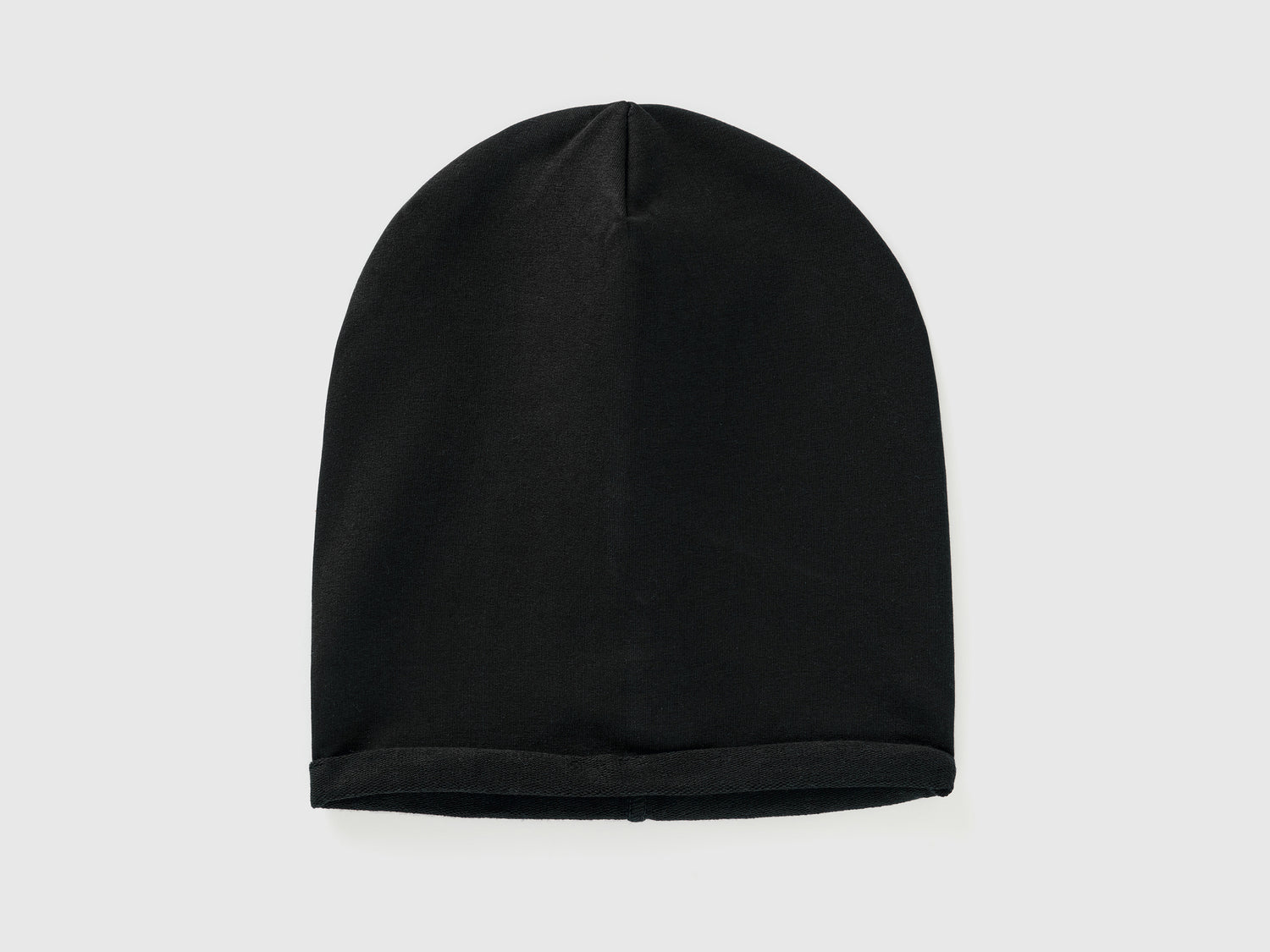 Cappellino in cotone elasticizzato da bambino nero | Benetton Outlet
