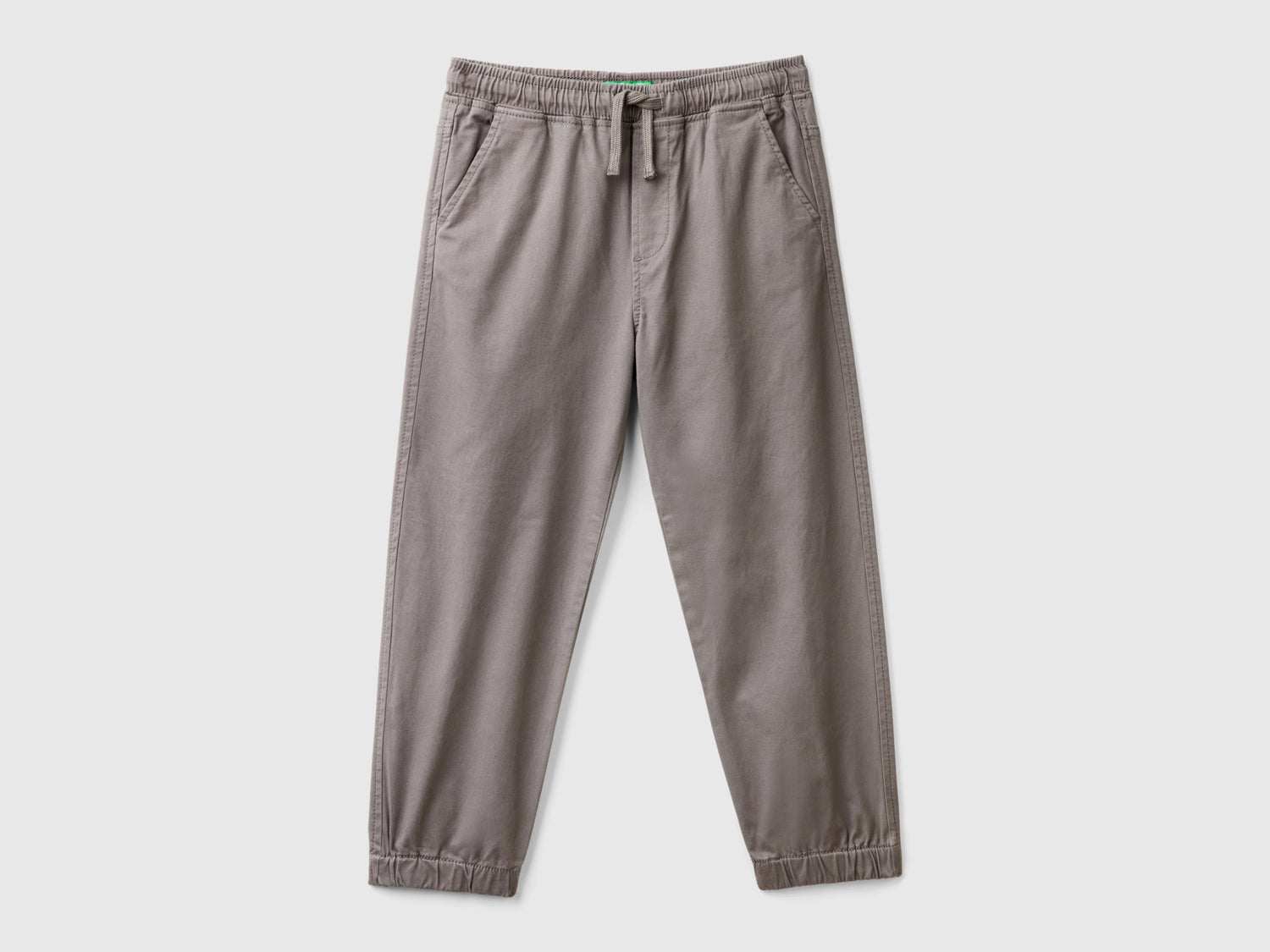 Joggers in cotone stretch con coulisse da bambino grigio scuro | Benetton Outlet