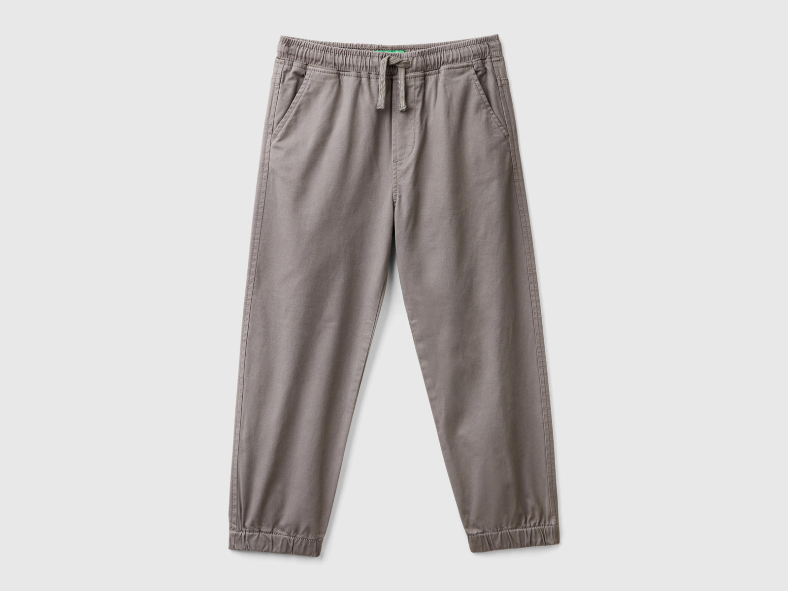 Joggers in cotone stretch con coulisse da bambino grigio scuro | Benetton Outlet
