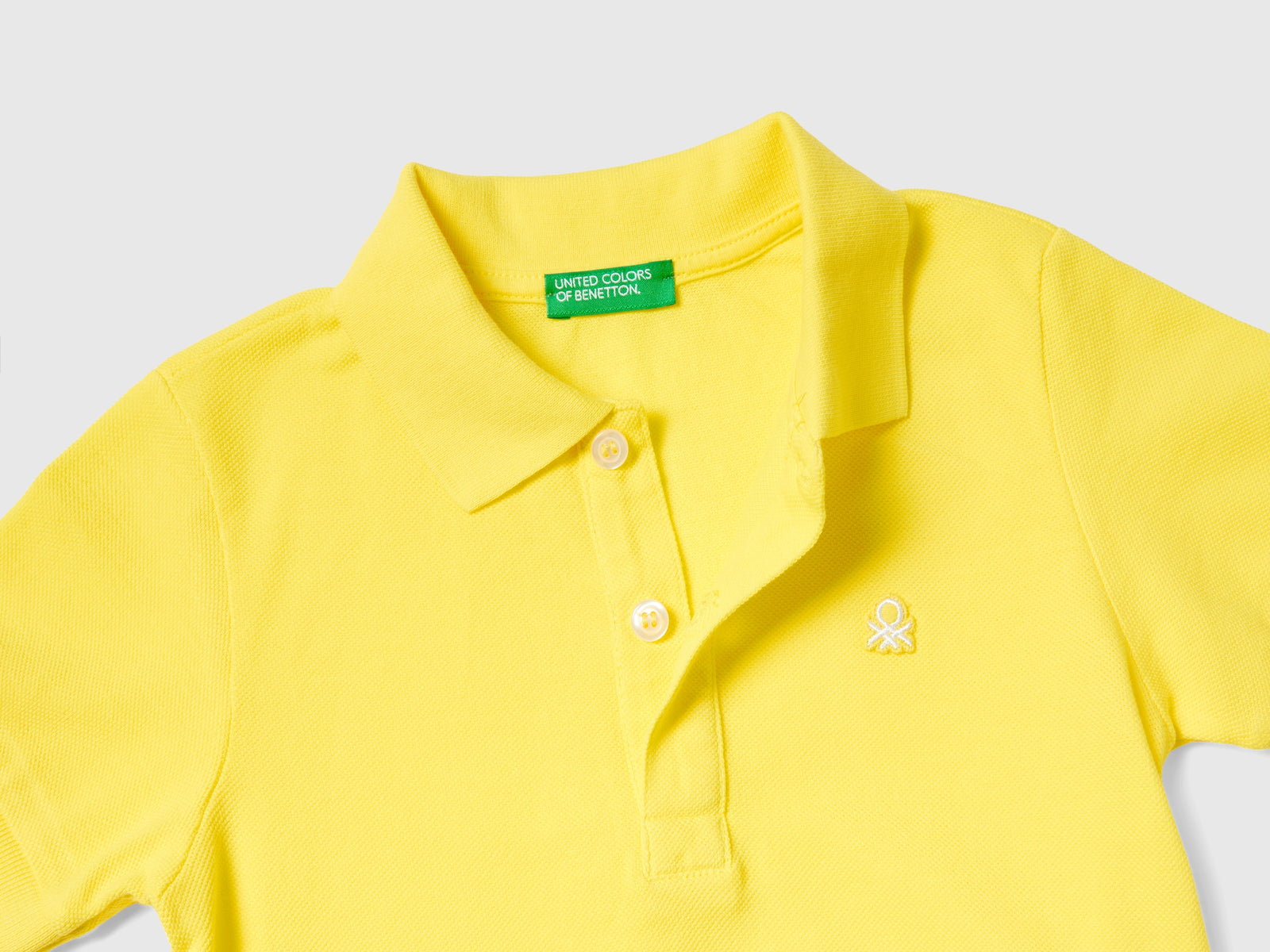 Polo manica corta in cotone da bimbo giallo 2 | Benetton Outlet
