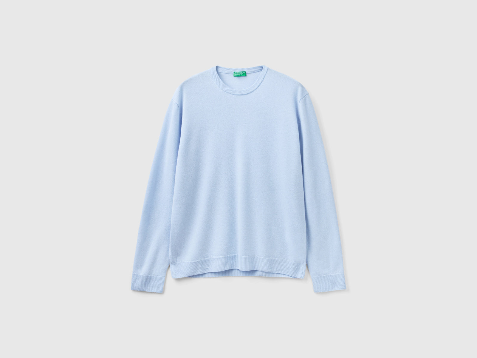 Maglia girocollo in pura lana Merino da uomo celeste | Benetton Outlet