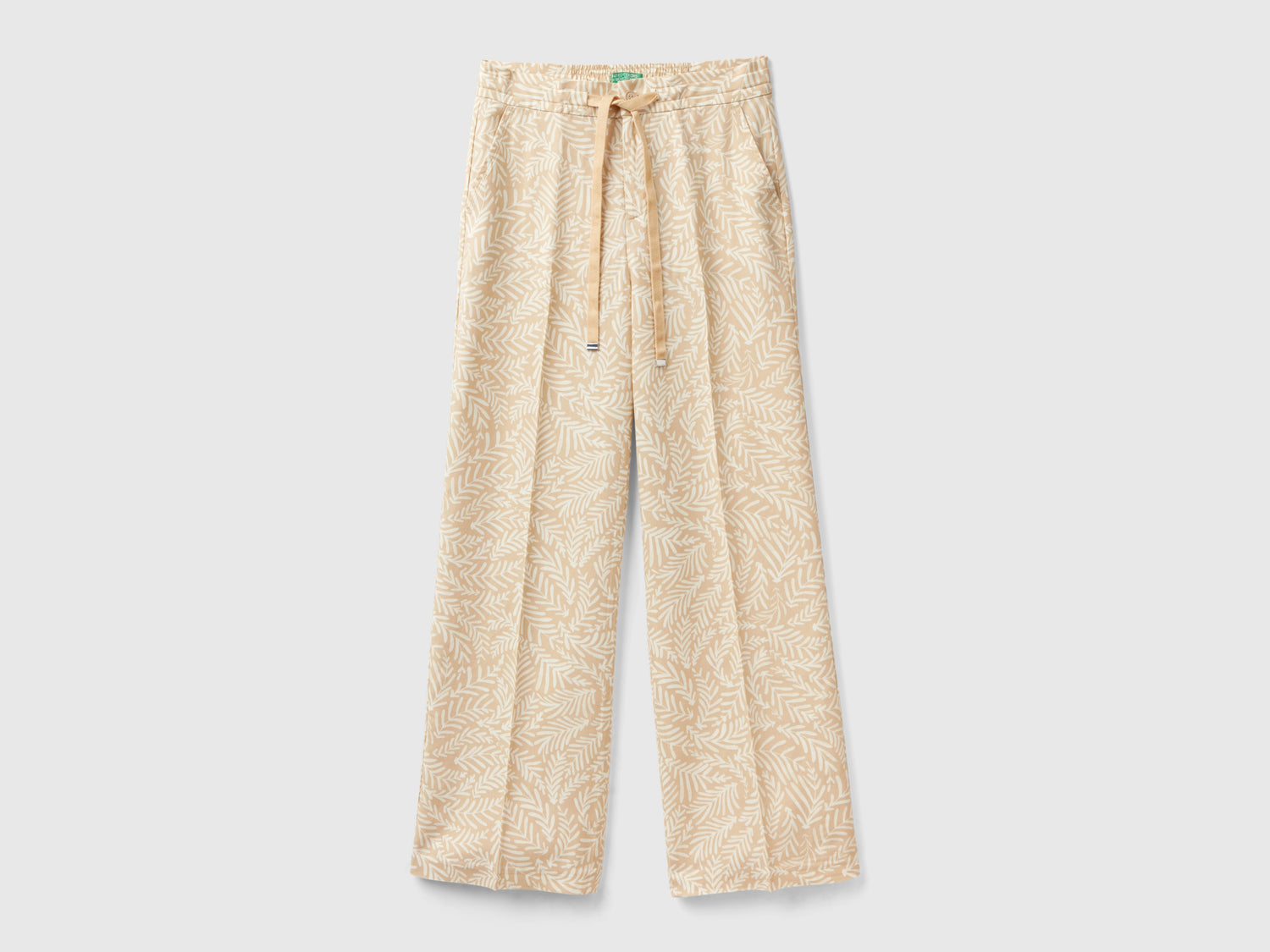 Pantaloni fantasia in viscosa da donna beige | Benetton Outlet