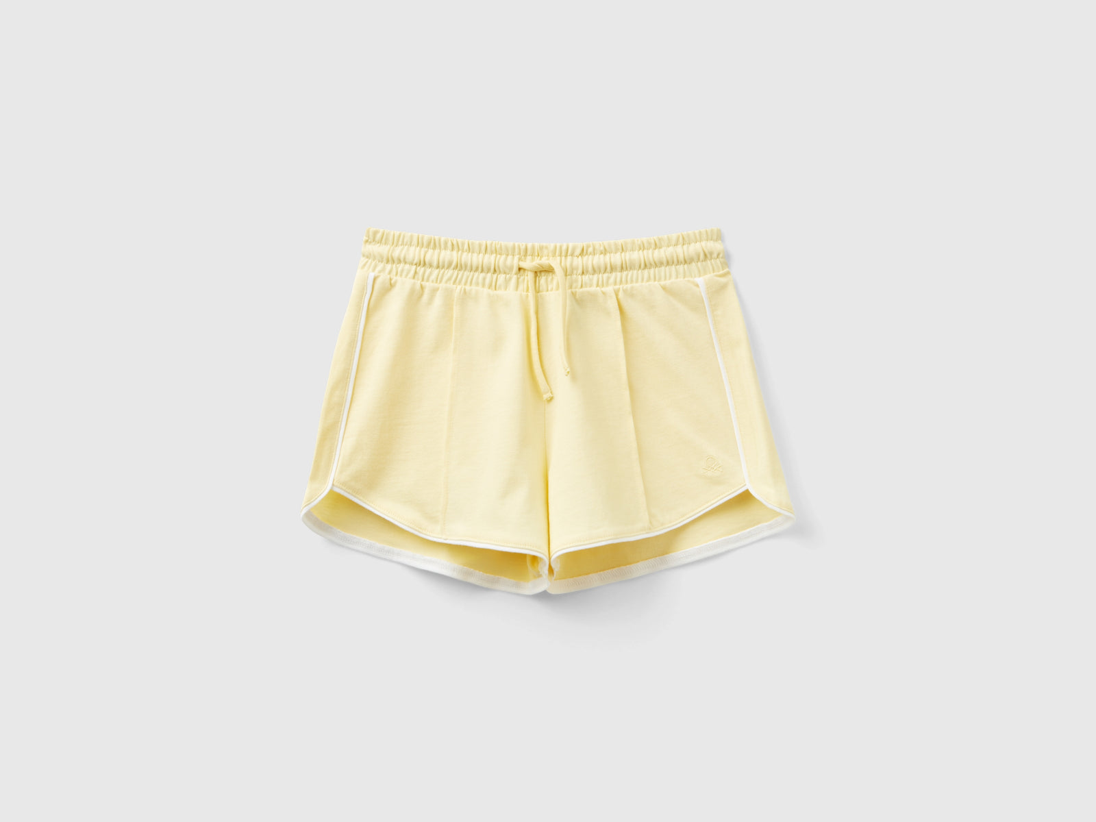 Shorts con coulisse 100% cotone da bambina giallo | Benetton Outlet