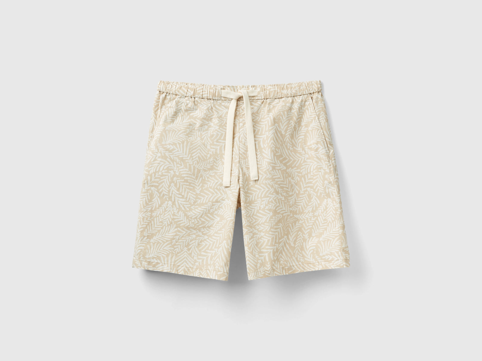 Pantaloni corti fantasia da uomo beige | Benetton Outlet