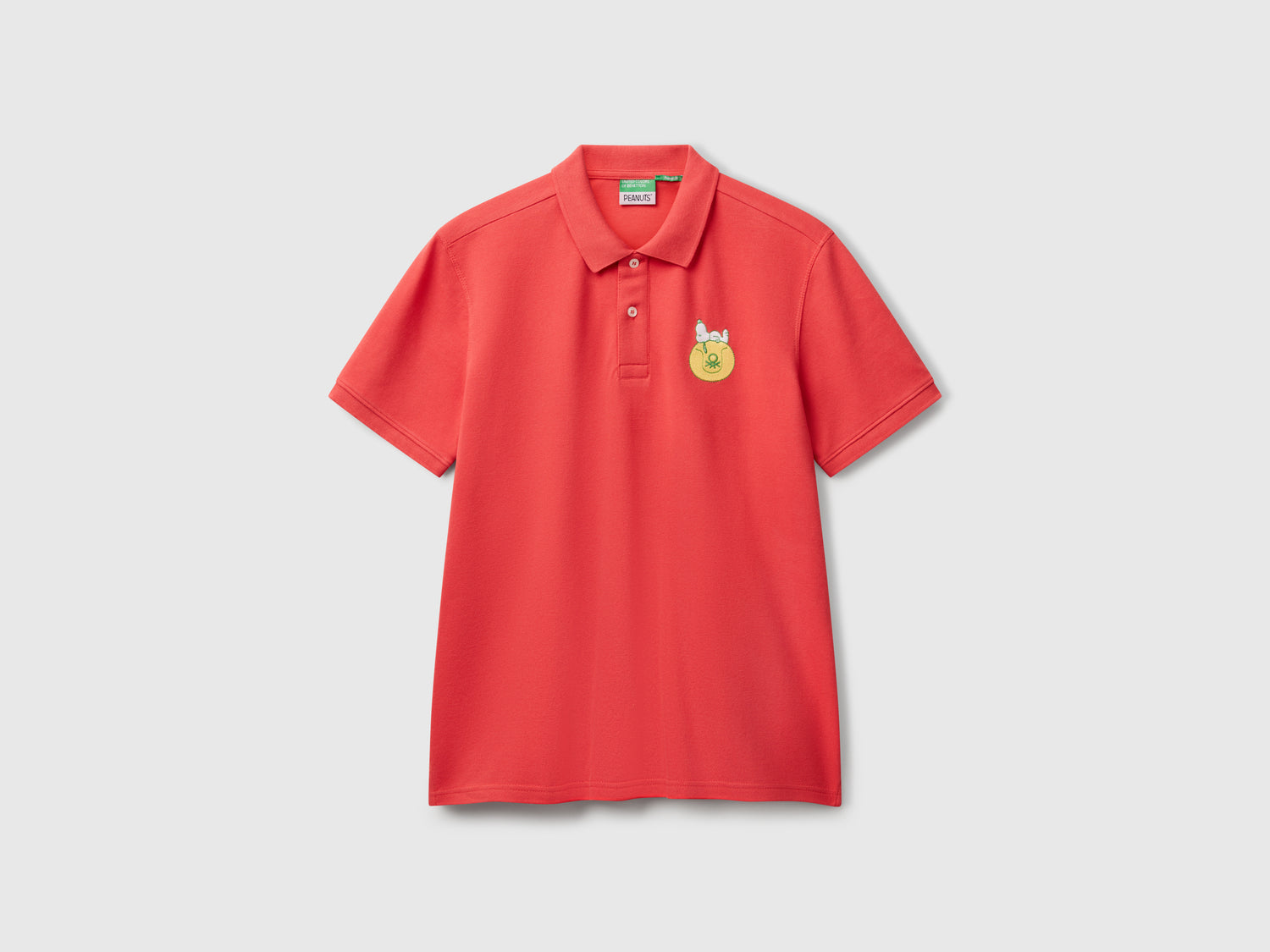 Polo regular fit Snoopy ©Peanuts da uomo rosso mattone | Benetton Outlet