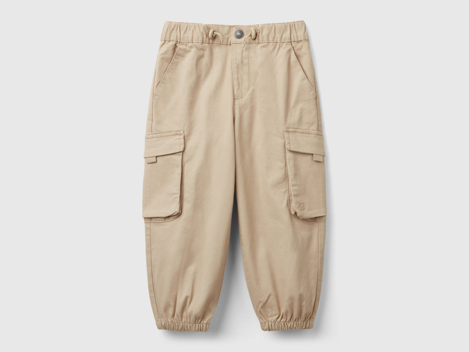Pantaloni parachute in cotone stretch da bimbo beige | Benetton Outlet