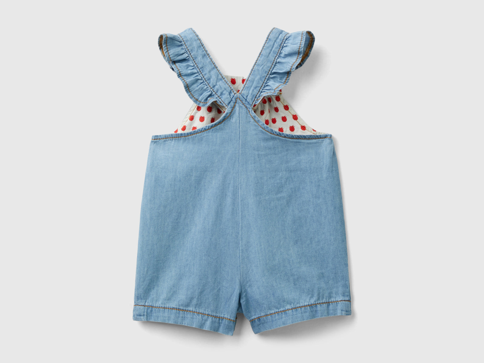 Salopette in chambray con alette da neonato azzurro 2 | Benetton Outlet