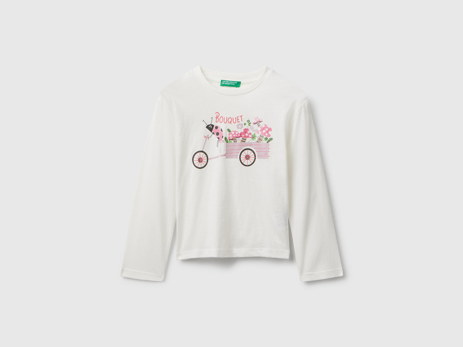 Maglietta in cotone con stampa glitter da bimba bianco panna | Benetton Outlet
