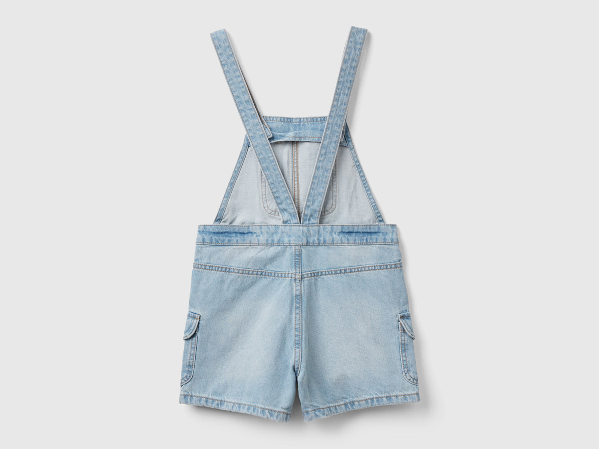 Salopette di jeans con tasche