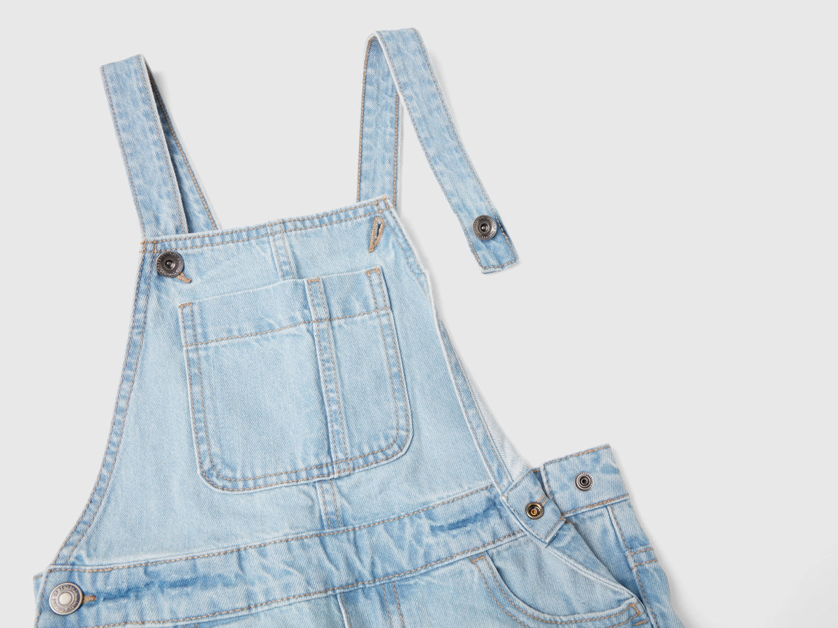 Salopette di jeans con tasche