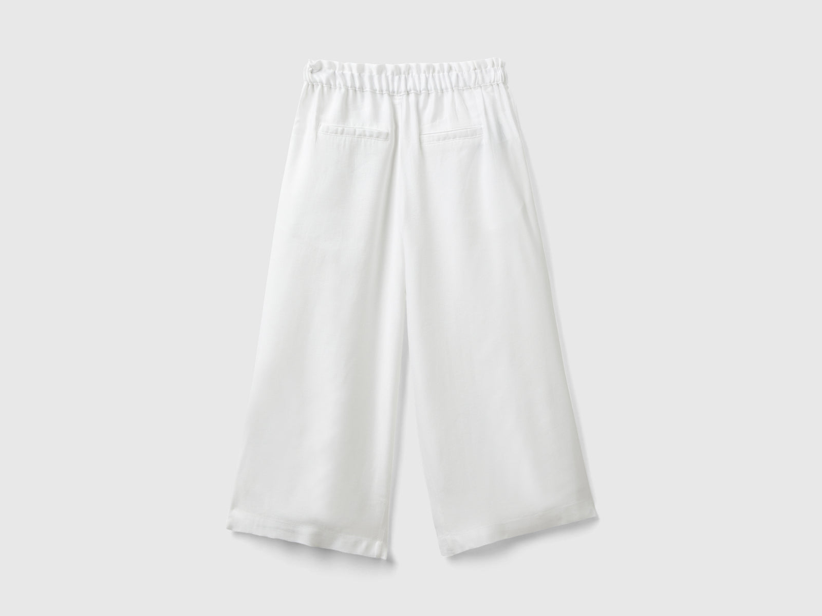 Pantaloni fluidi a palazzo da bimba bianco 2 | Benetton Outlet