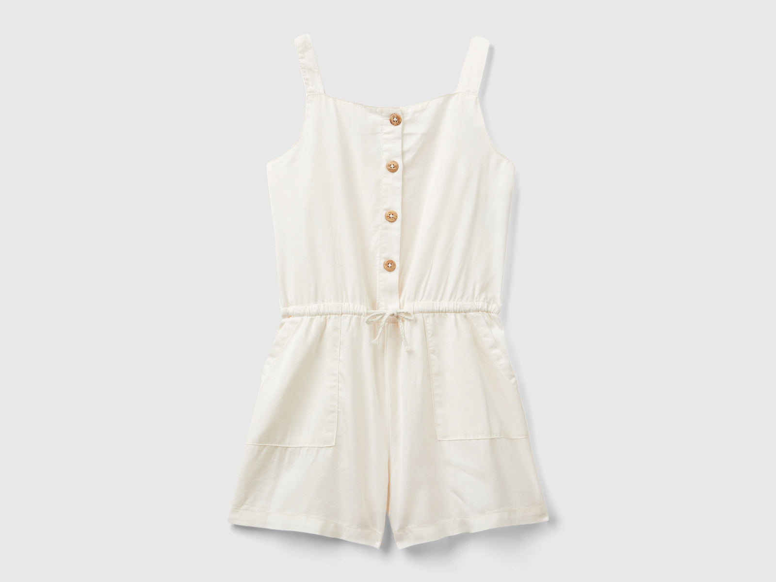 Tuta fluida con coulisse da bambina bianco panna | Benetton Outlet