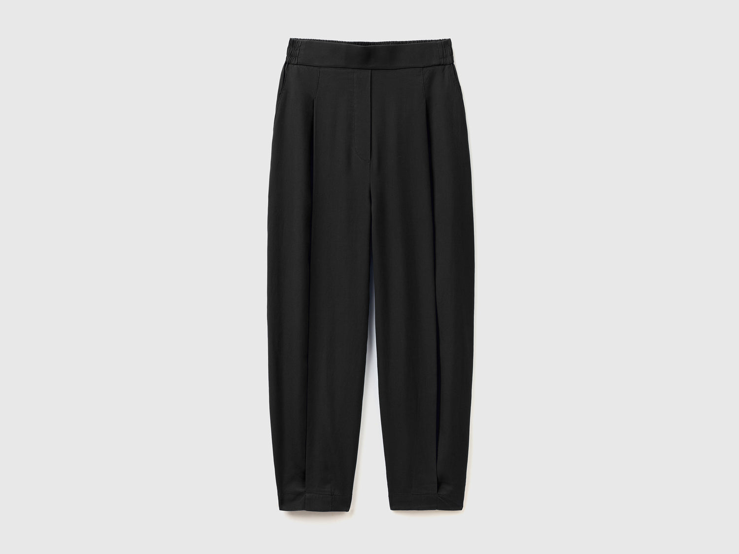 Pantaloni cropped con pieghe da donna nero | Benetton Outlet