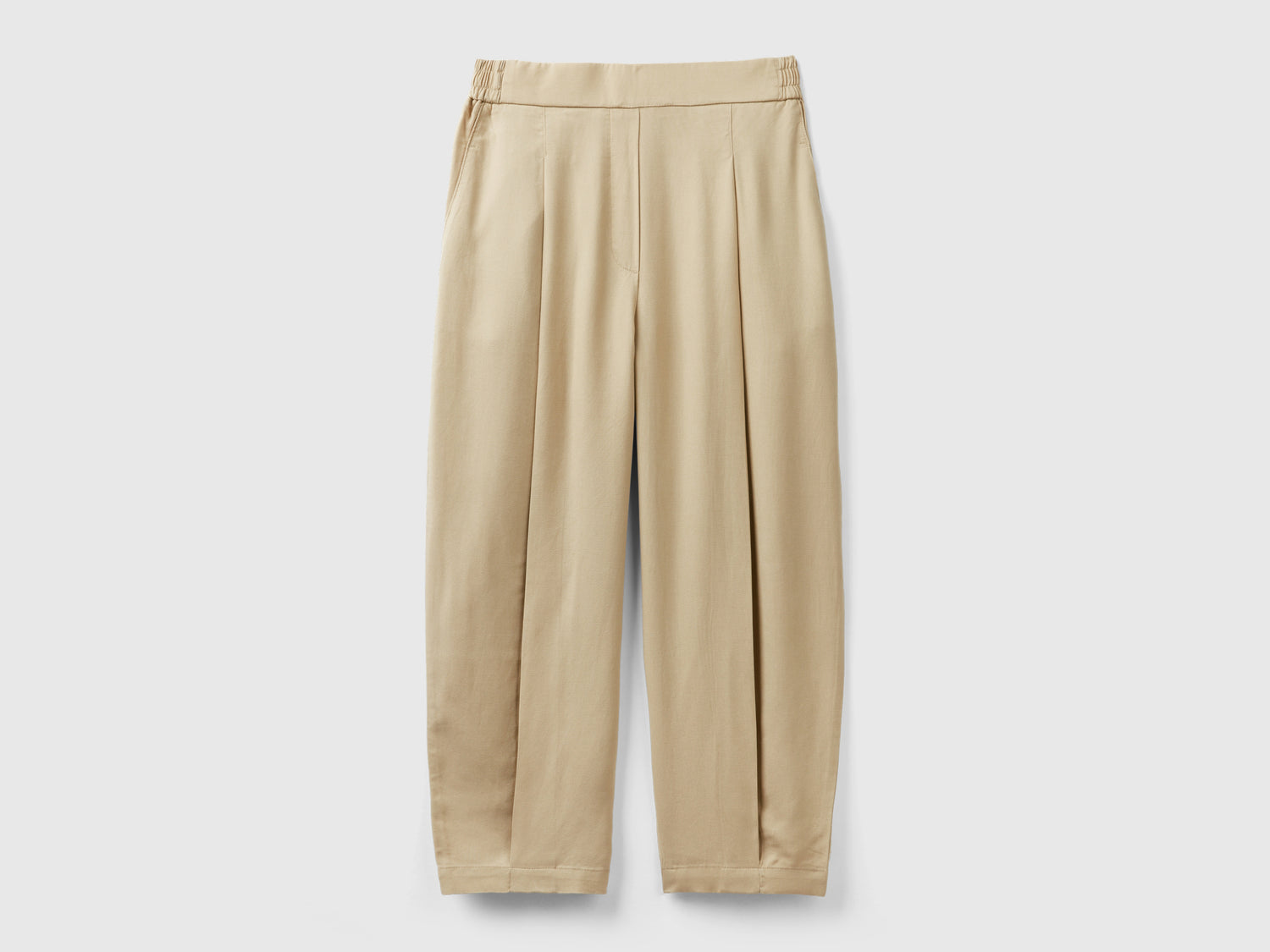 Pantaloni cropped con pieghe da donna beige | Benetton Outlet