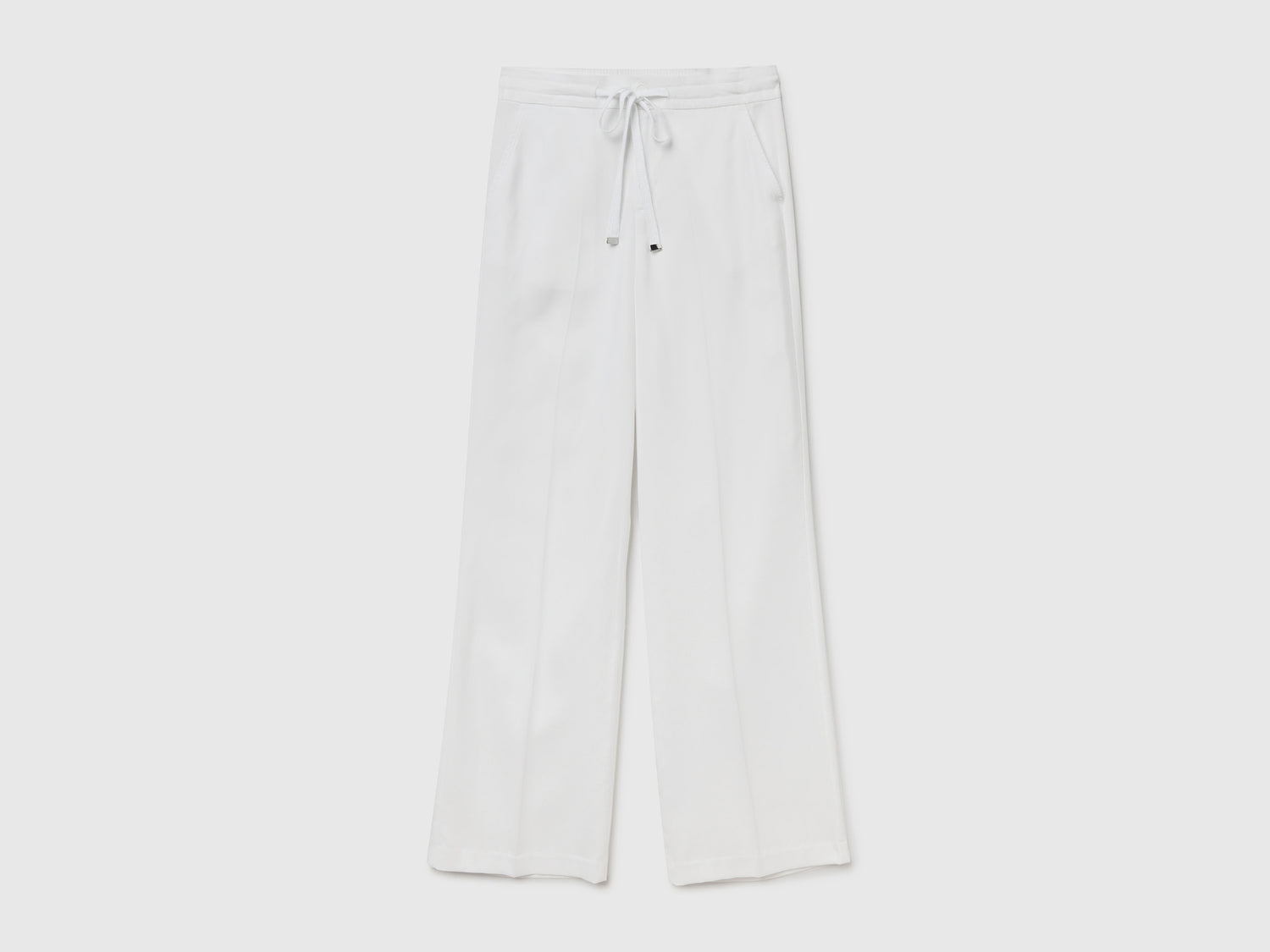 Pantaloni in puro lyocell da donna bianco | Benetton Outlet