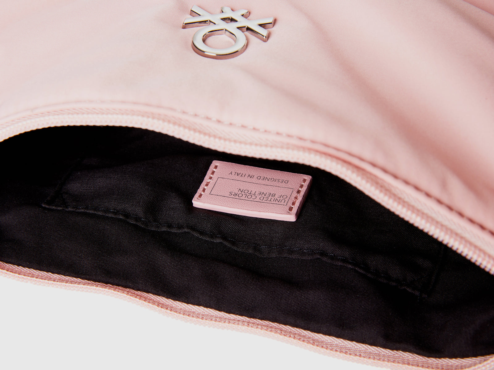 Borsa tracolla a mezzaluna da donna rosa tenue 3 | Benetton Outlet