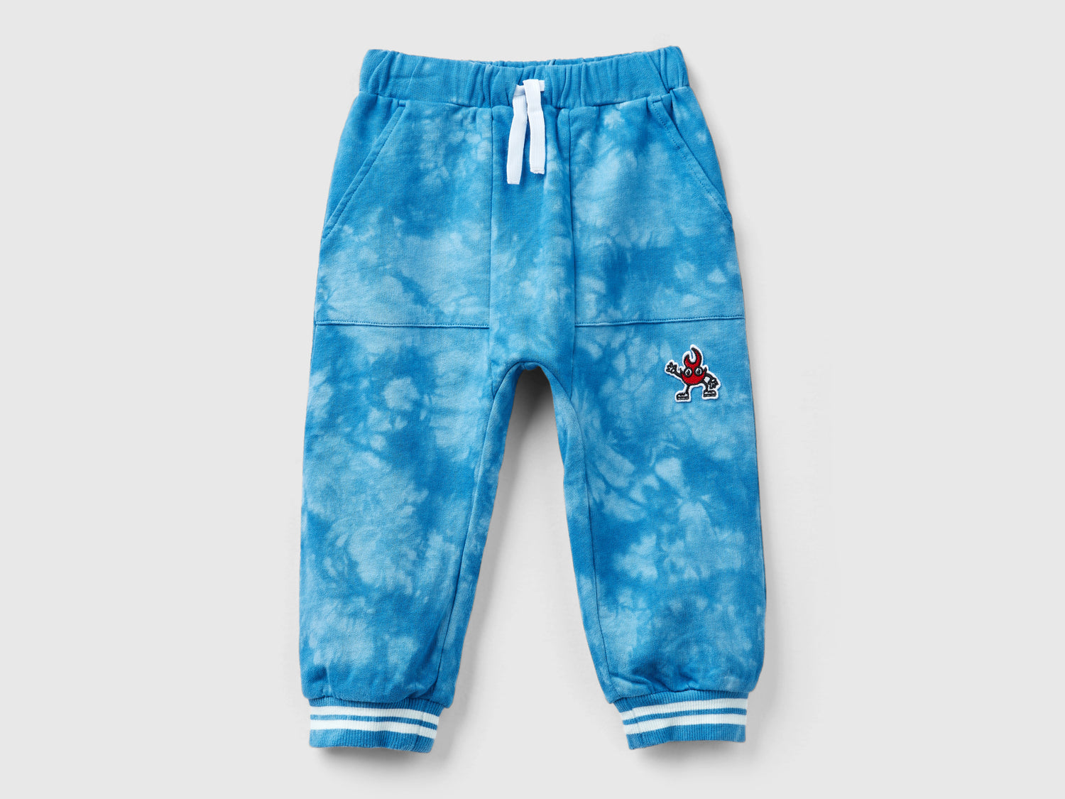Pantaloni tye-dye in felpa da bimbo azzurro | Benetton Outlet