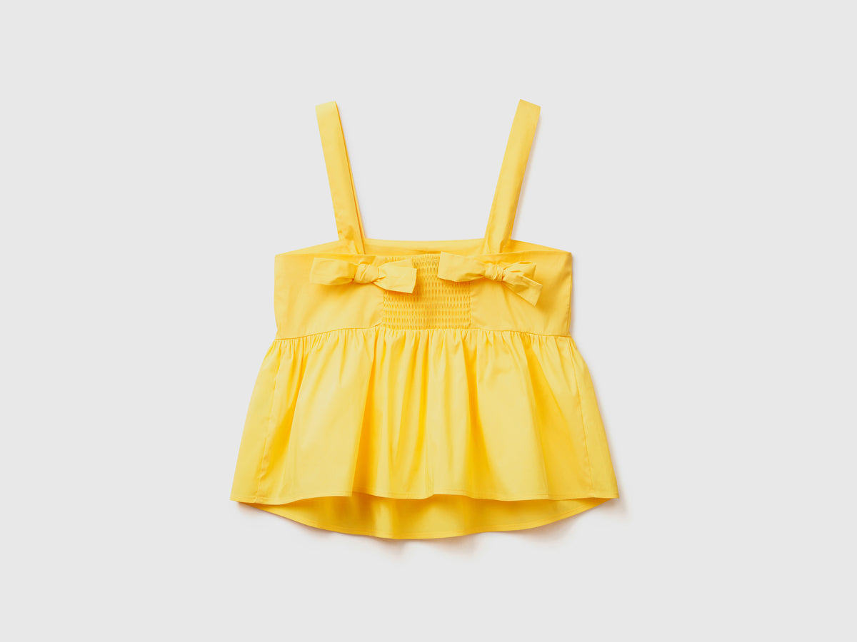 Top a canotta in misto cotone elasticizzato con balza arricciata