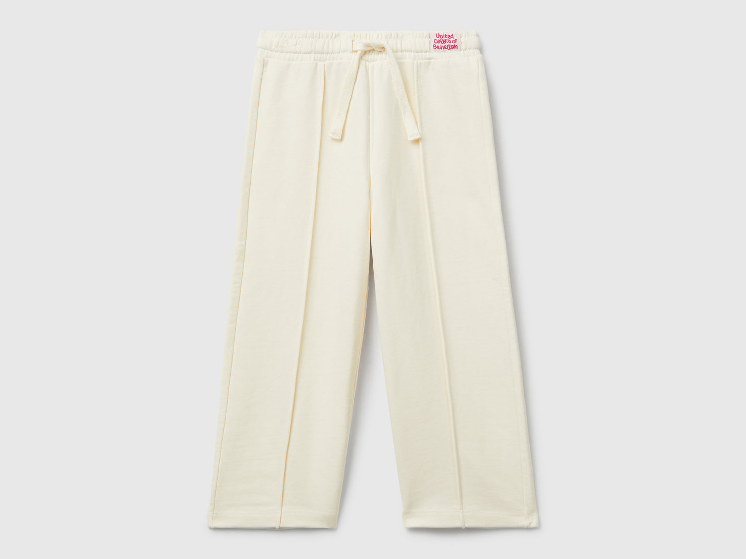 Pantaloni in felpa wide fit da bimba bianco panna | Benetton Outlet